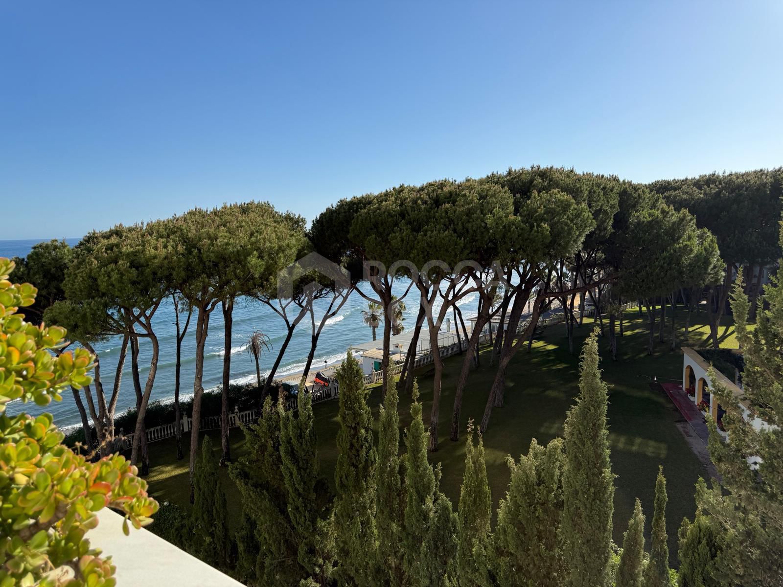 Luxury Beachfront Apartment with Panoramic Views in Prime Location