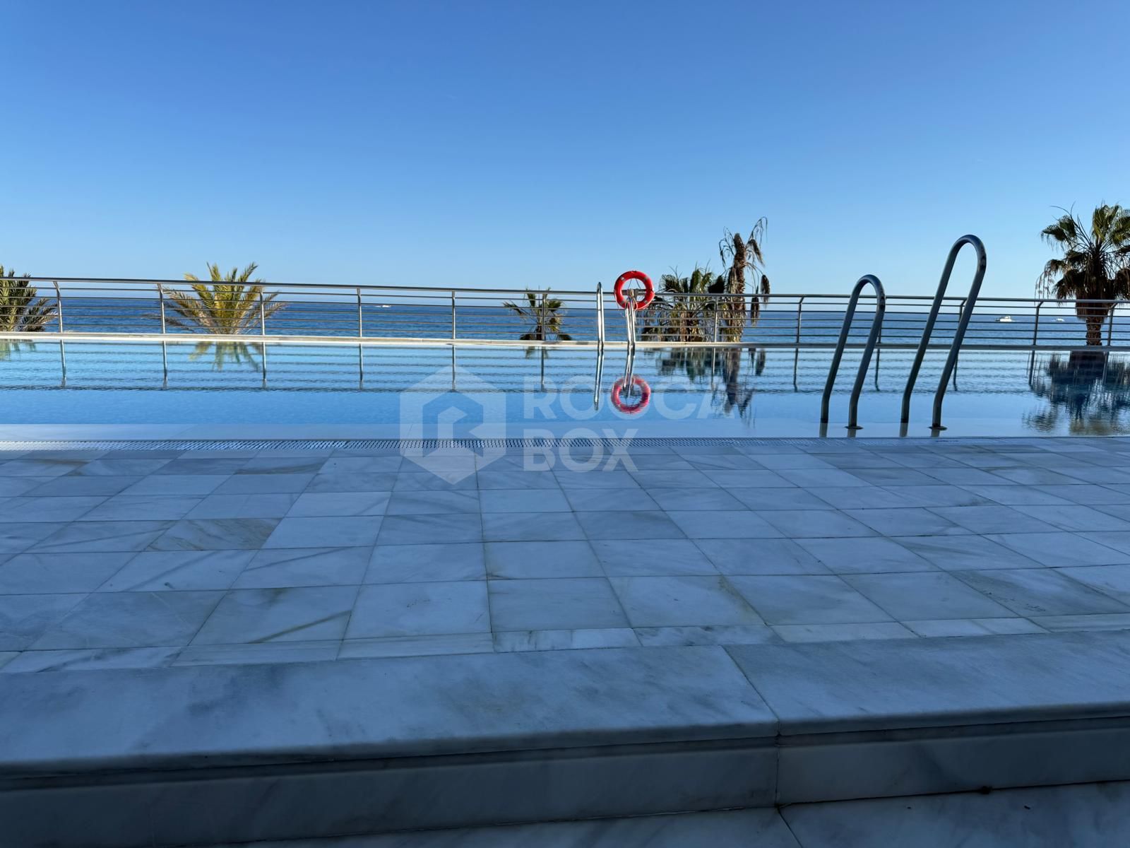 Luxury Beachfront Apartment with Panoramic Views in Prime Location