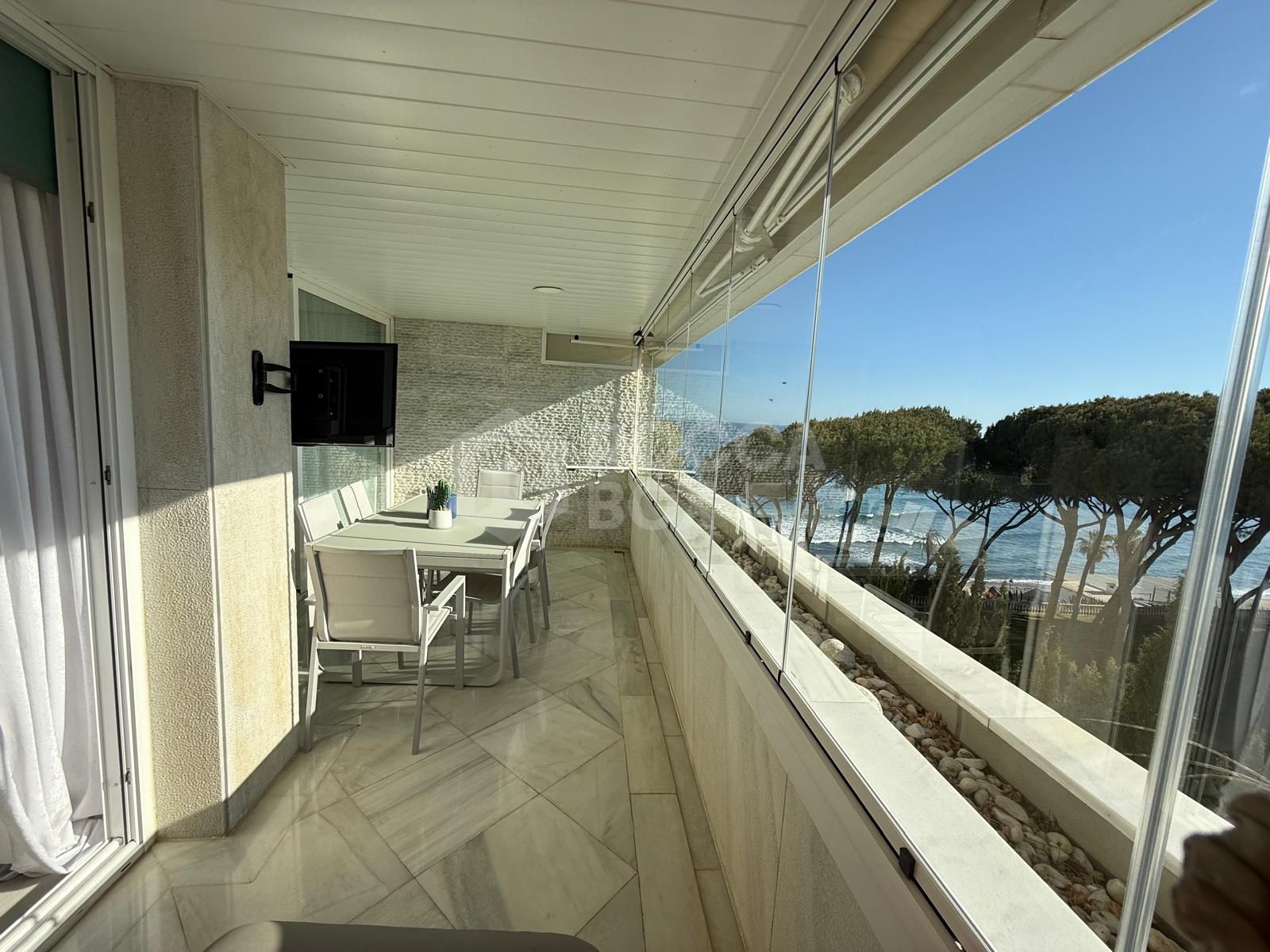 Luxury Beachfront Apartment with Panoramic Views in Prime Location