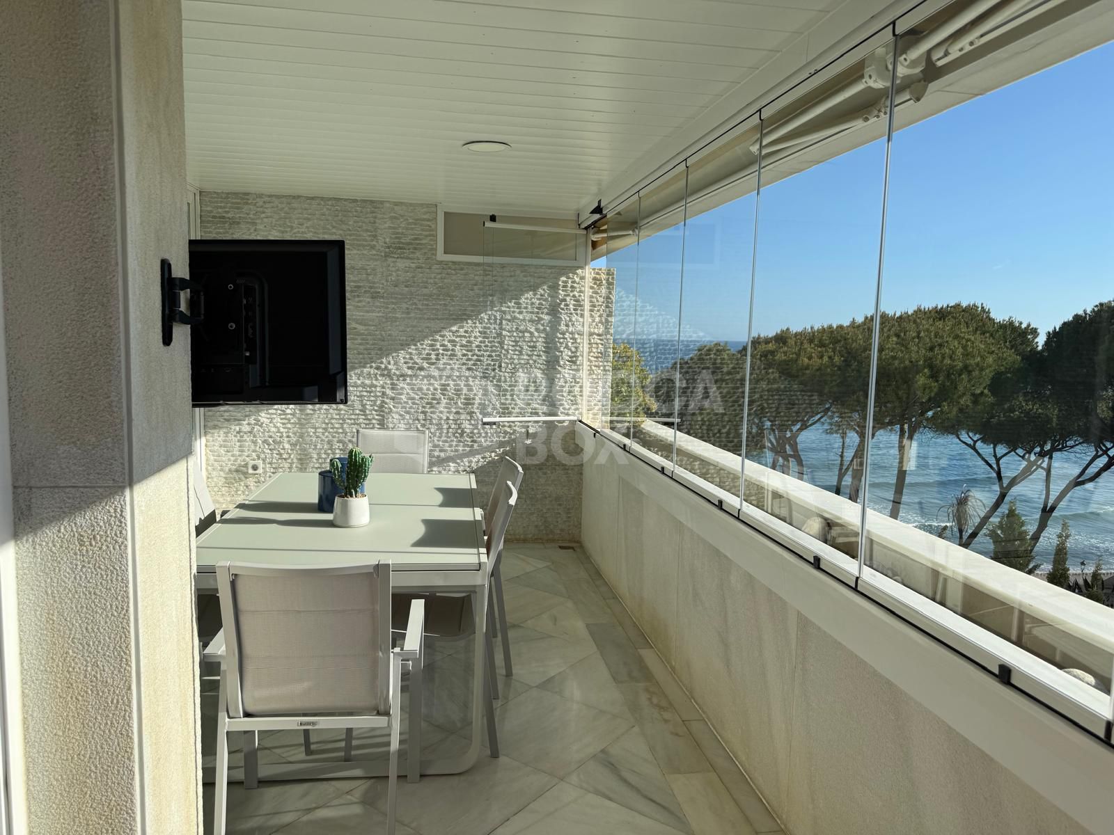 Luxury Beachfront Apartment with Panoramic Views in Prime Location