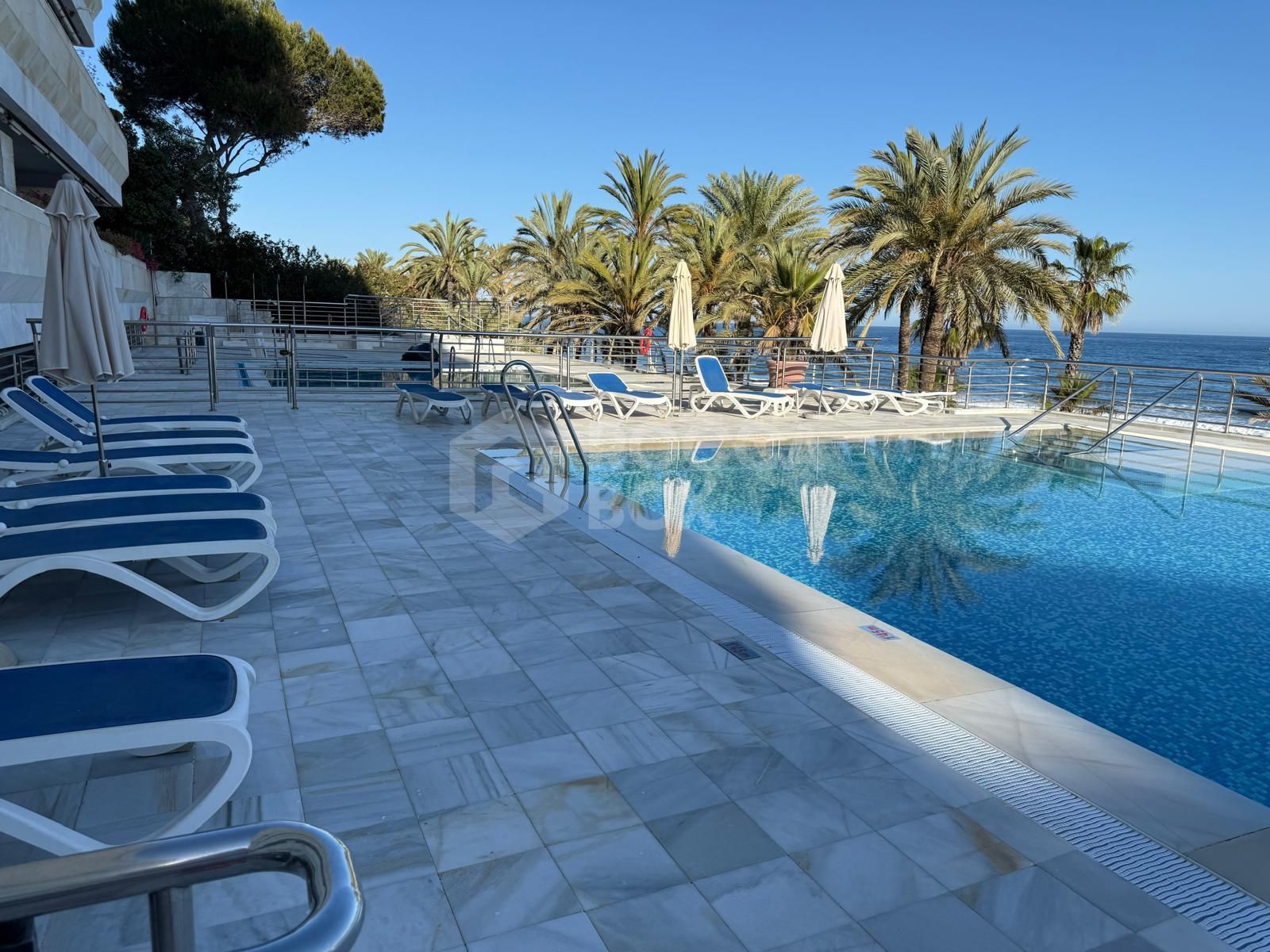 Luxury Beachfront Apartment with Panoramic Views in Prime Location