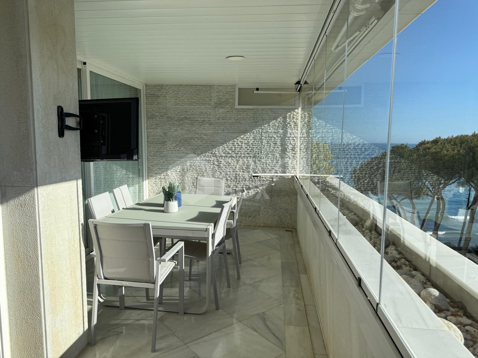 Luxury Beachfront Apartment with Panoramic Views in Prime Location