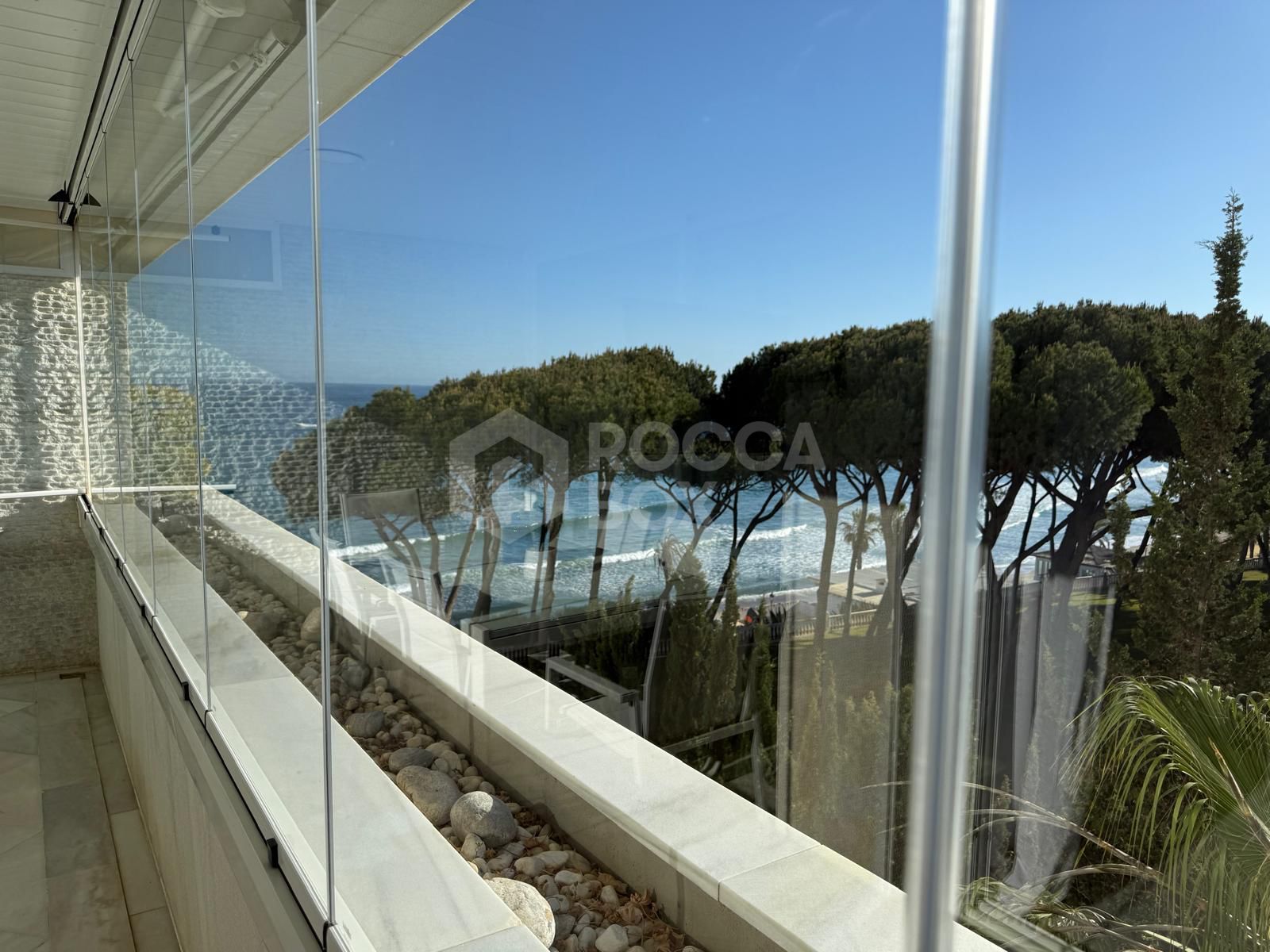 Luxury Beachfront Apartment with Panoramic Views in Prime Location