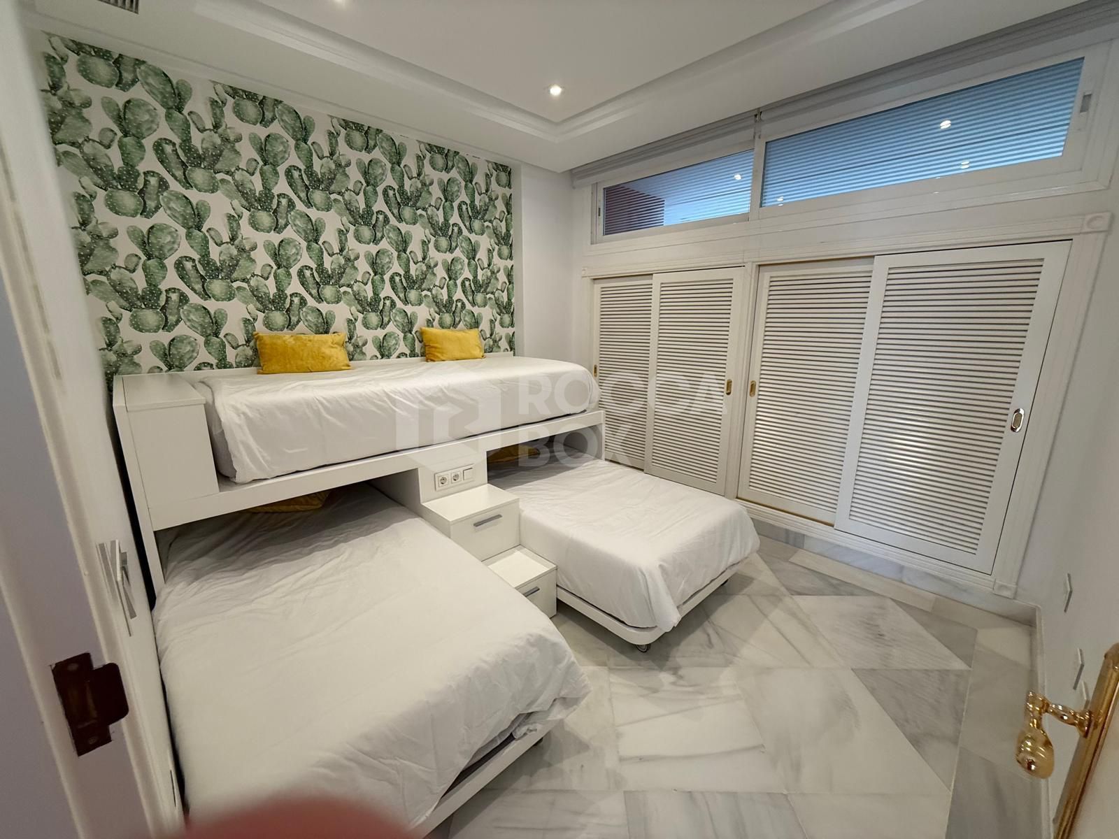 Luxury Beachfront Apartment with Panoramic Views in Prime Location