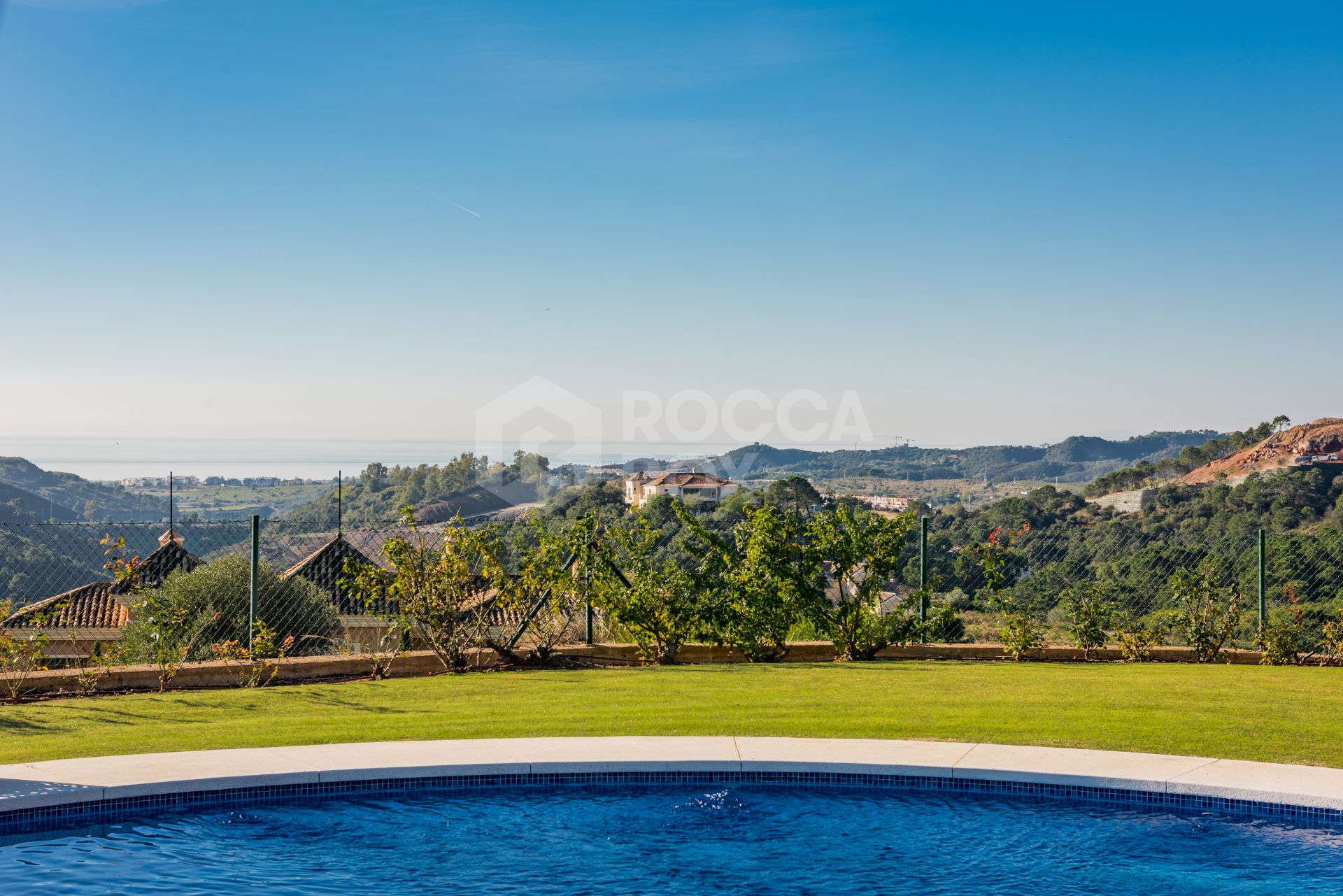Exquisite Villa with Panoramic Views, Manicured Garden, and Resort-Level Security