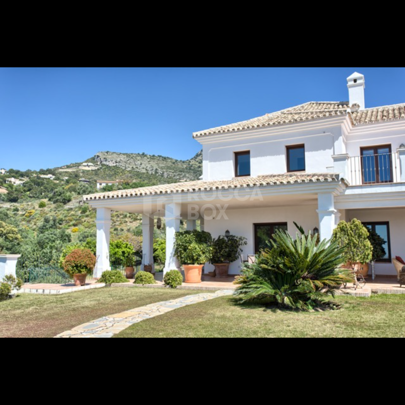 Exquisite Villa with Panoramic Views, Manicured Garden, and Resort-Level Security