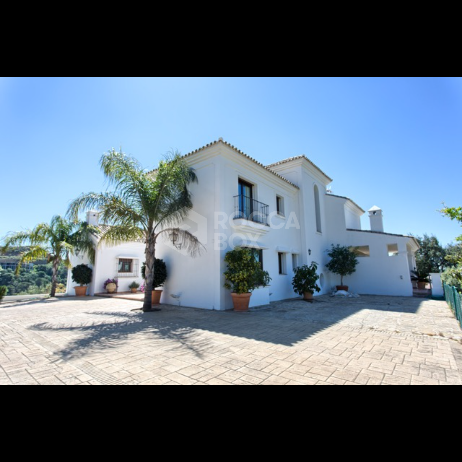 Exquisite Villa with Panoramic Views, Manicured Garden, and Resort-Level Security