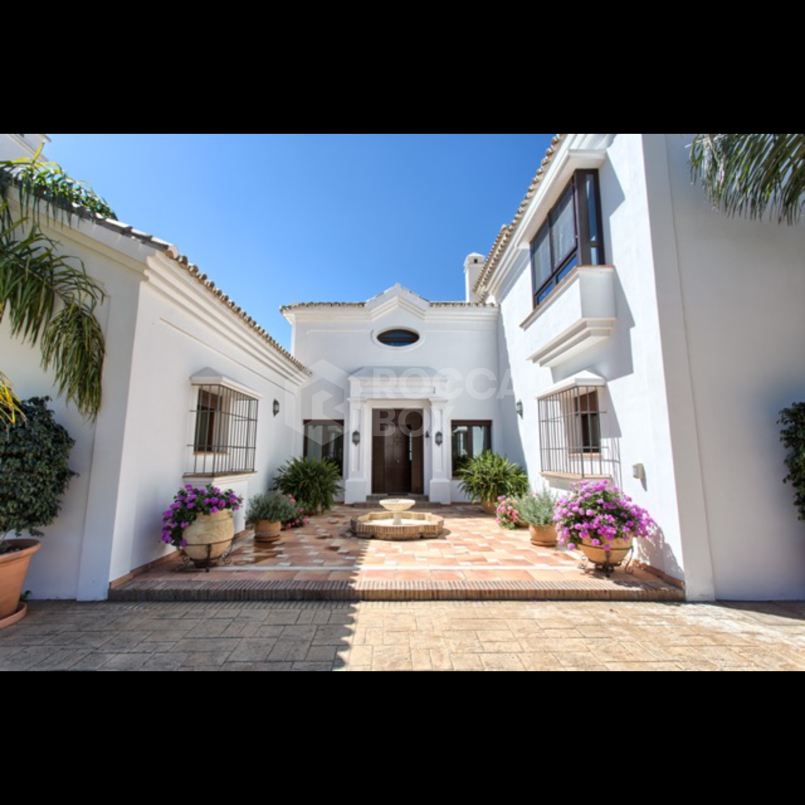 Exquisite Villa with Panoramic Views, Manicured Garden, and Resort-Level Security