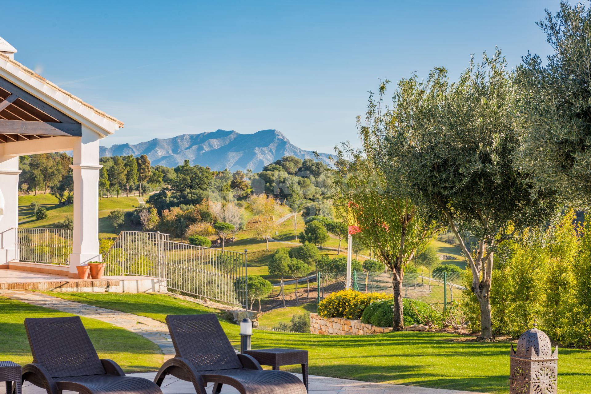 Exquisite Villa with Panoramic Views, Manicured Garden, and Resort-Level Security