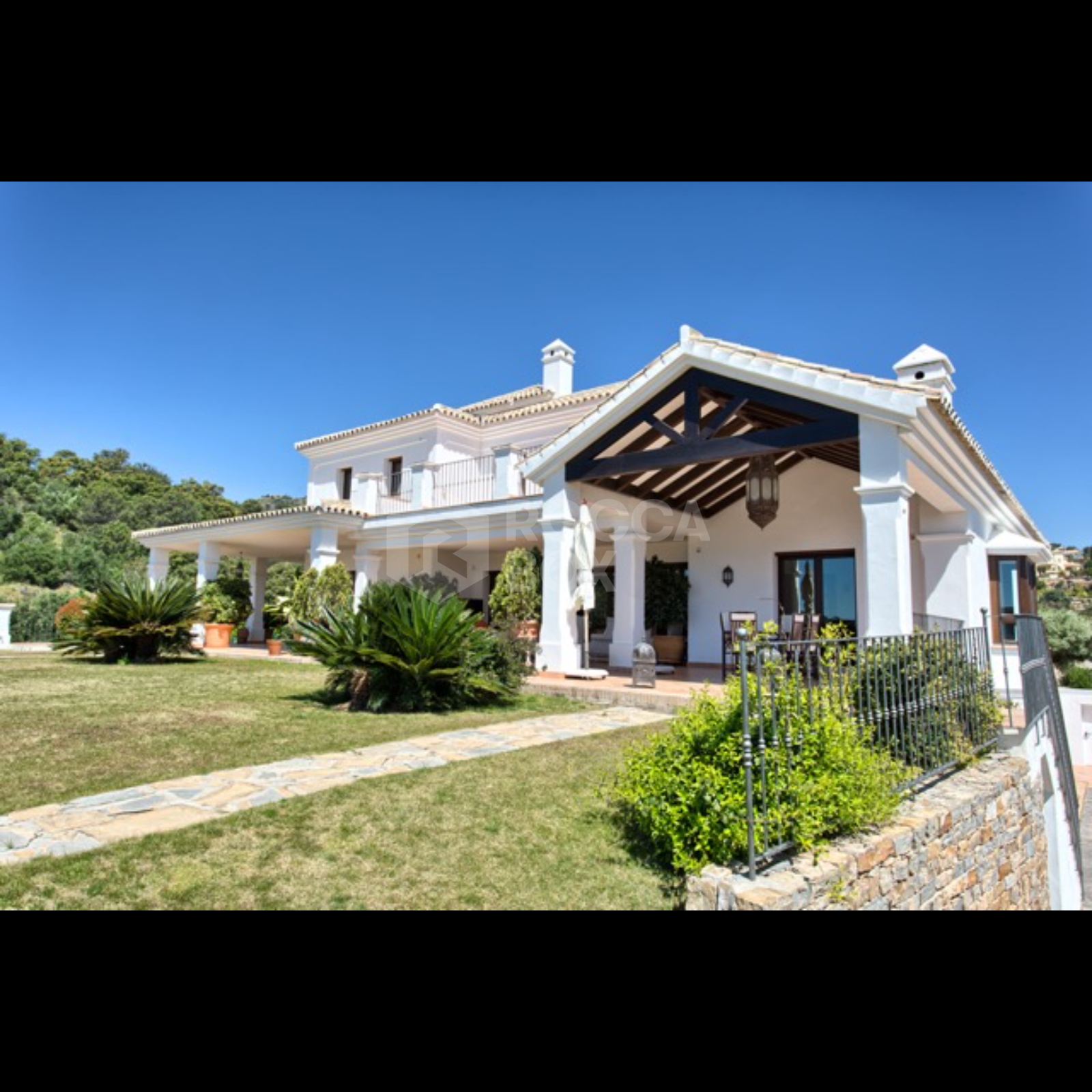 Exquisite Villa with Panoramic Views, Manicured Garden, and Resort-Level Security