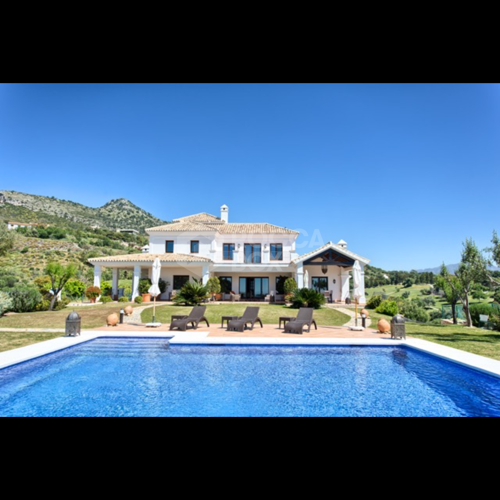 Exquisite Villa with Panoramic Views, Manicured Garden, and Resort-Level Security