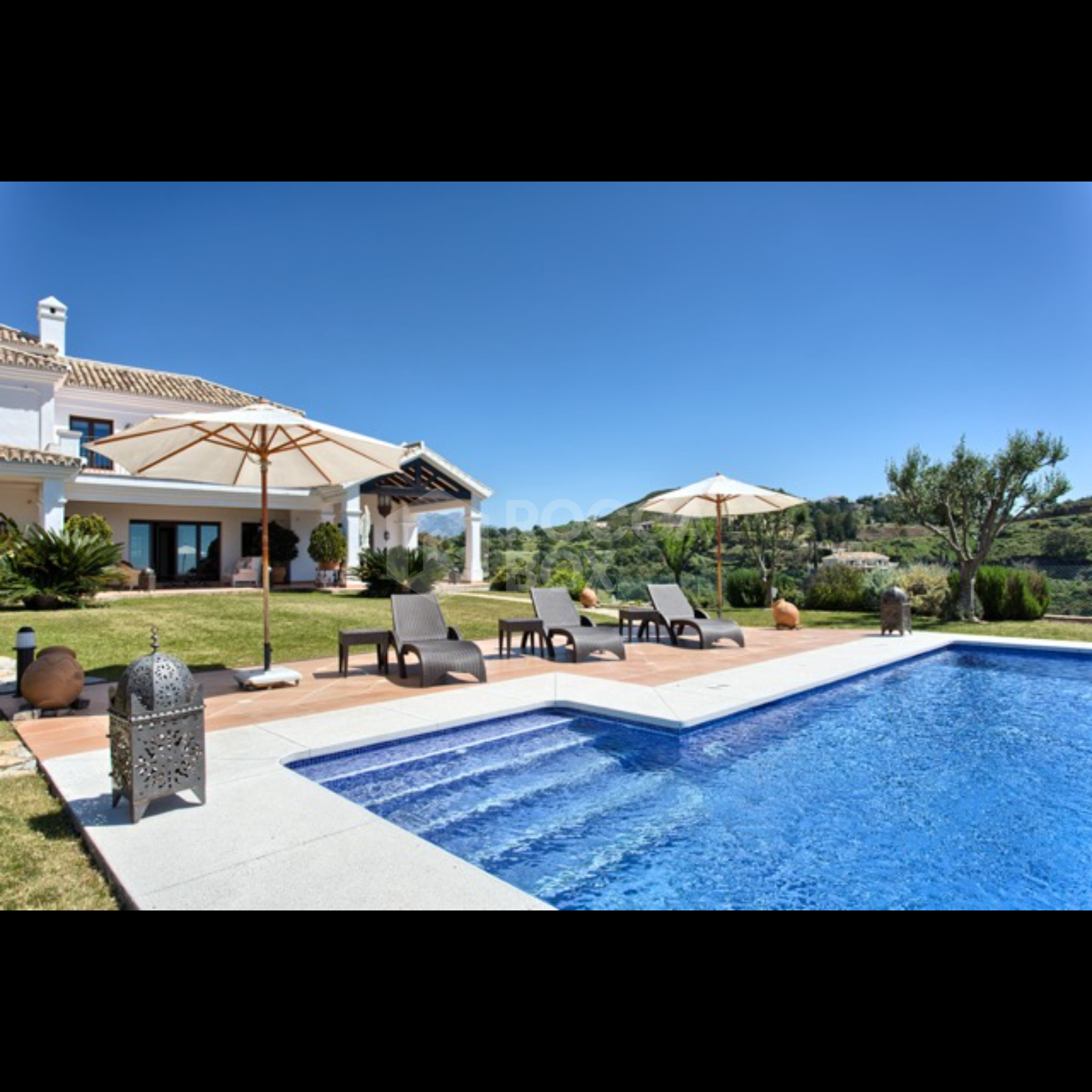 Exquisite Villa with Panoramic Views, Manicured Garden, and Resort-Level Security
