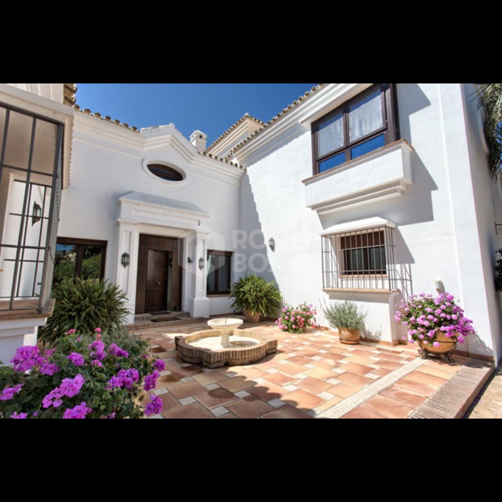 Exquisite Villa with Panoramic Views, Manicured Garden, and Resort-Level Security