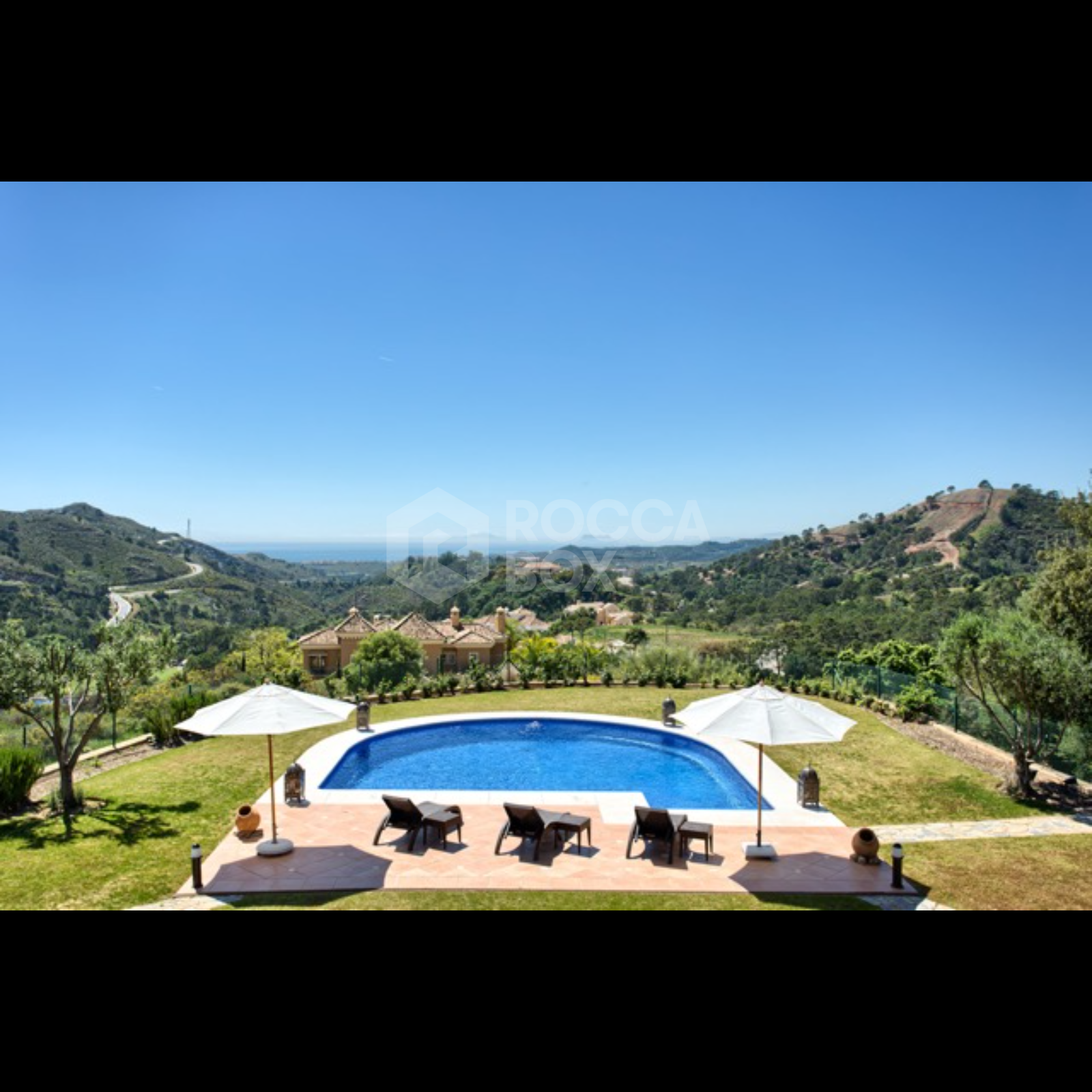 Exquisite Villa with Panoramic Views, Manicured Garden, and Resort-Level Security