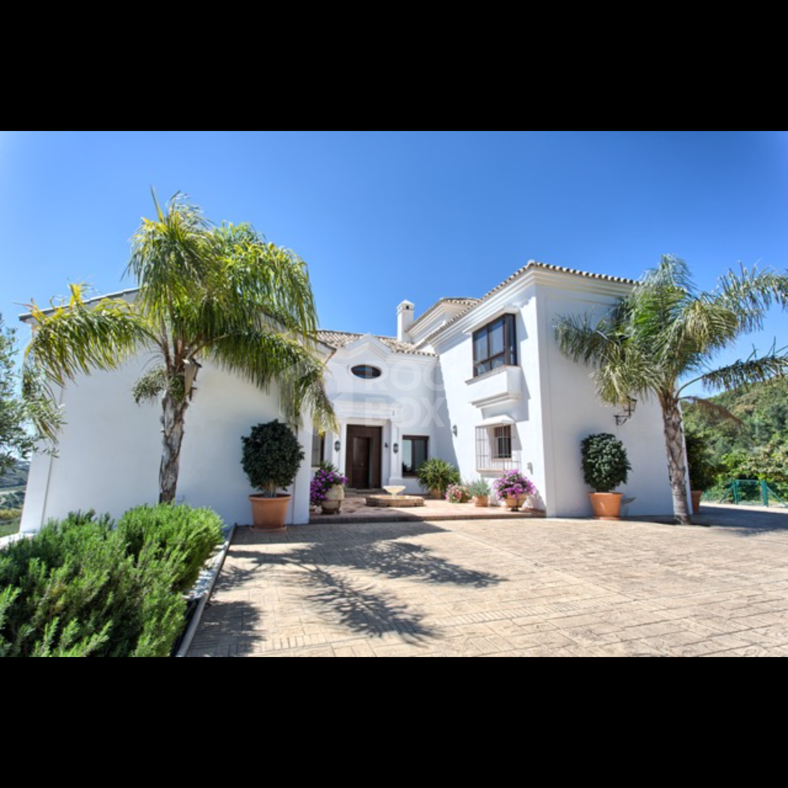 Exquisite Villa with Panoramic Views, Manicured Garden, and Resort-Level Security