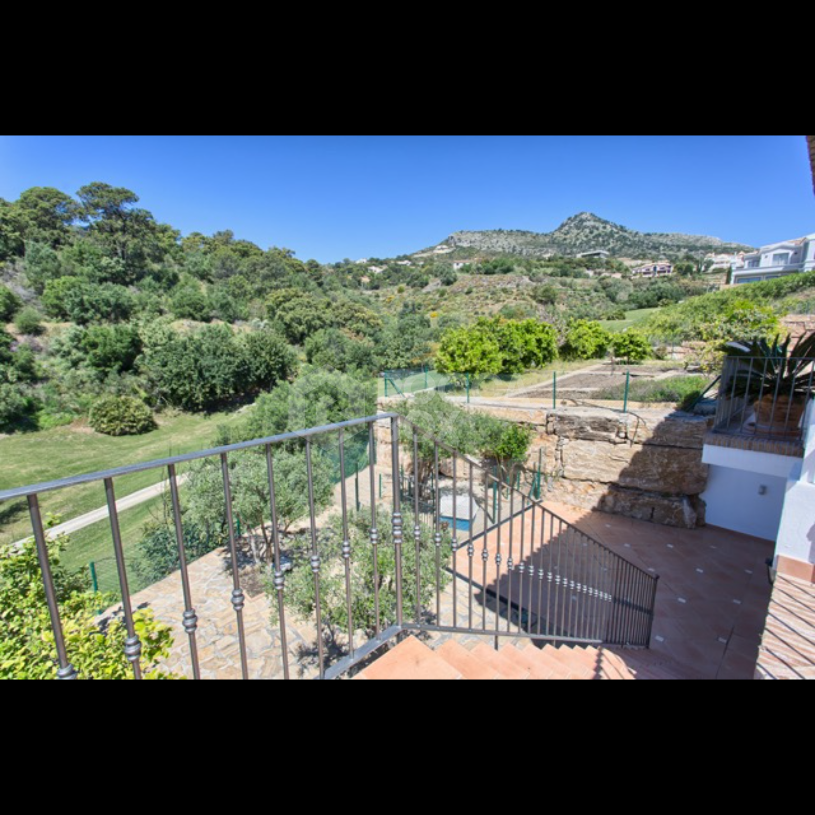 Exquisite Villa with Panoramic Views, Manicured Garden, and Resort-Level Security