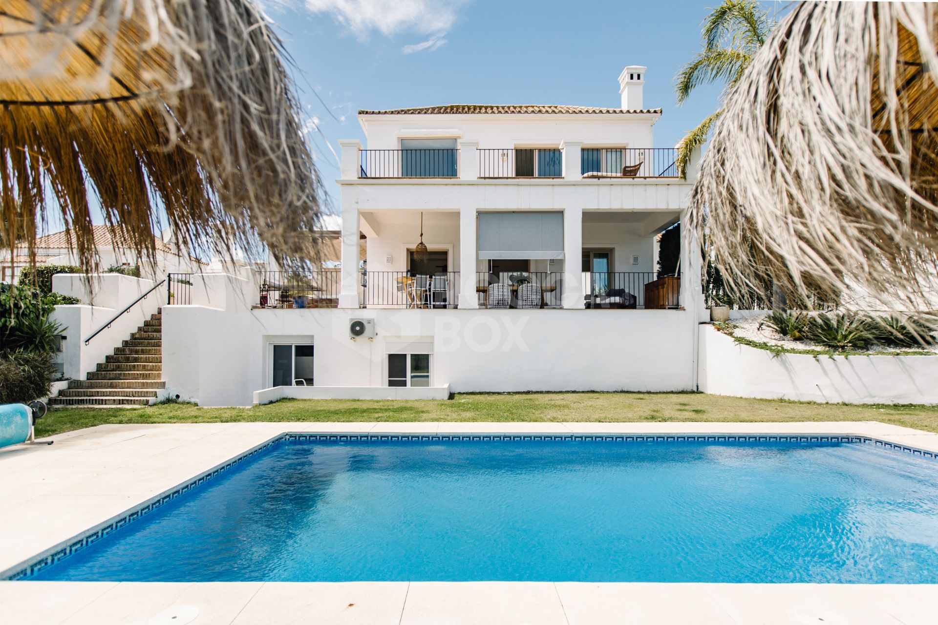 Elegant Andalusian-Style Villa Frontline to La Resina Golf with Heated Pool & Garden Oasis