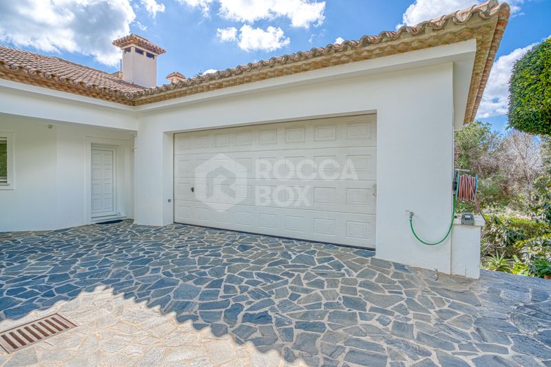 Elegant 4-Bedroom Villa with Sea & Mountain Views in Prestigious Hacienda Las Chapas, Marbella