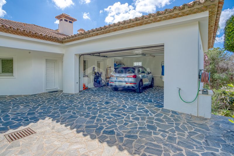 Elegant 4-Bedroom Villa with Sea & Mountain Views in Prestigious Hacienda Las Chapas, Marbella