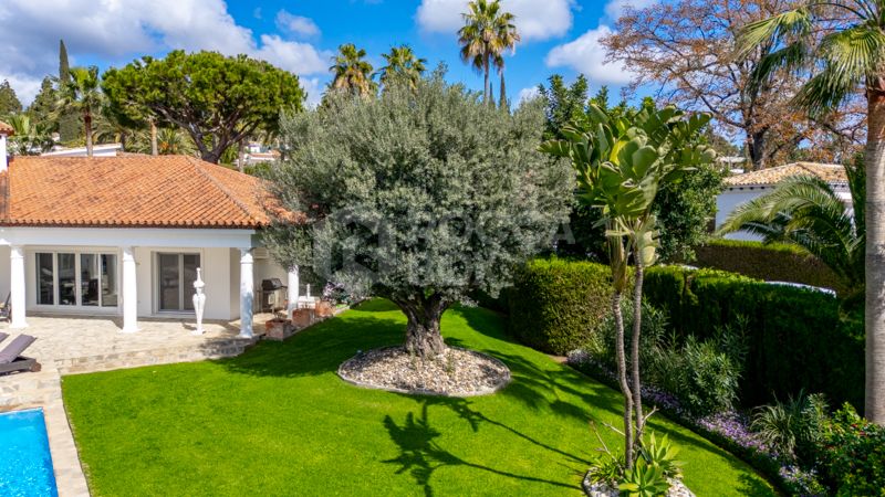 Elegant 4-Bedroom Villa with Sea & Mountain Views in Prestigious Hacienda Las Chapas, Marbella