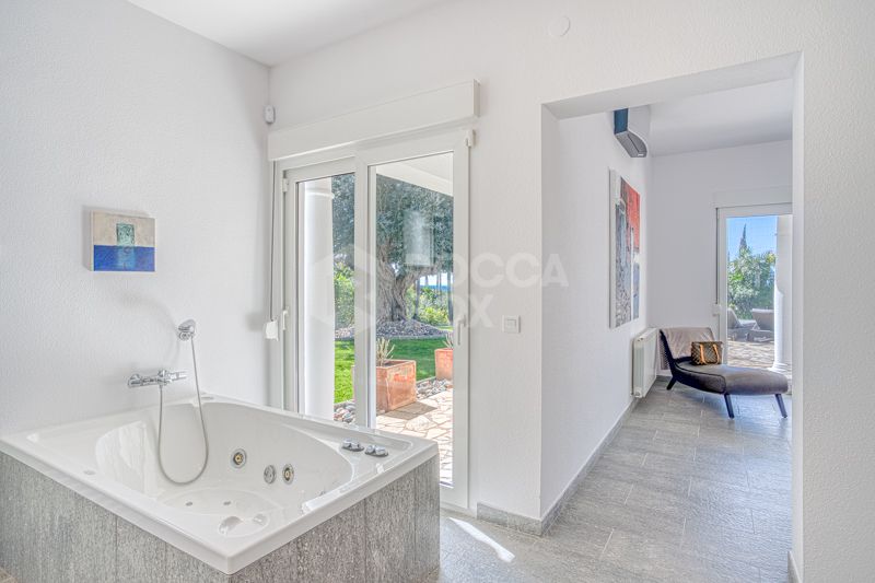 Elegant 4-Bedroom Villa with Sea & Mountain Views in Prestigious Hacienda Las Chapas, Marbella