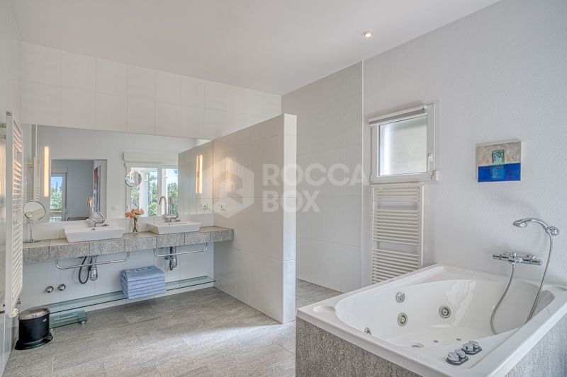 Elegant 4-Bedroom Villa with Sea & Mountain Views in Prestigious Hacienda Las Chapas, Marbella