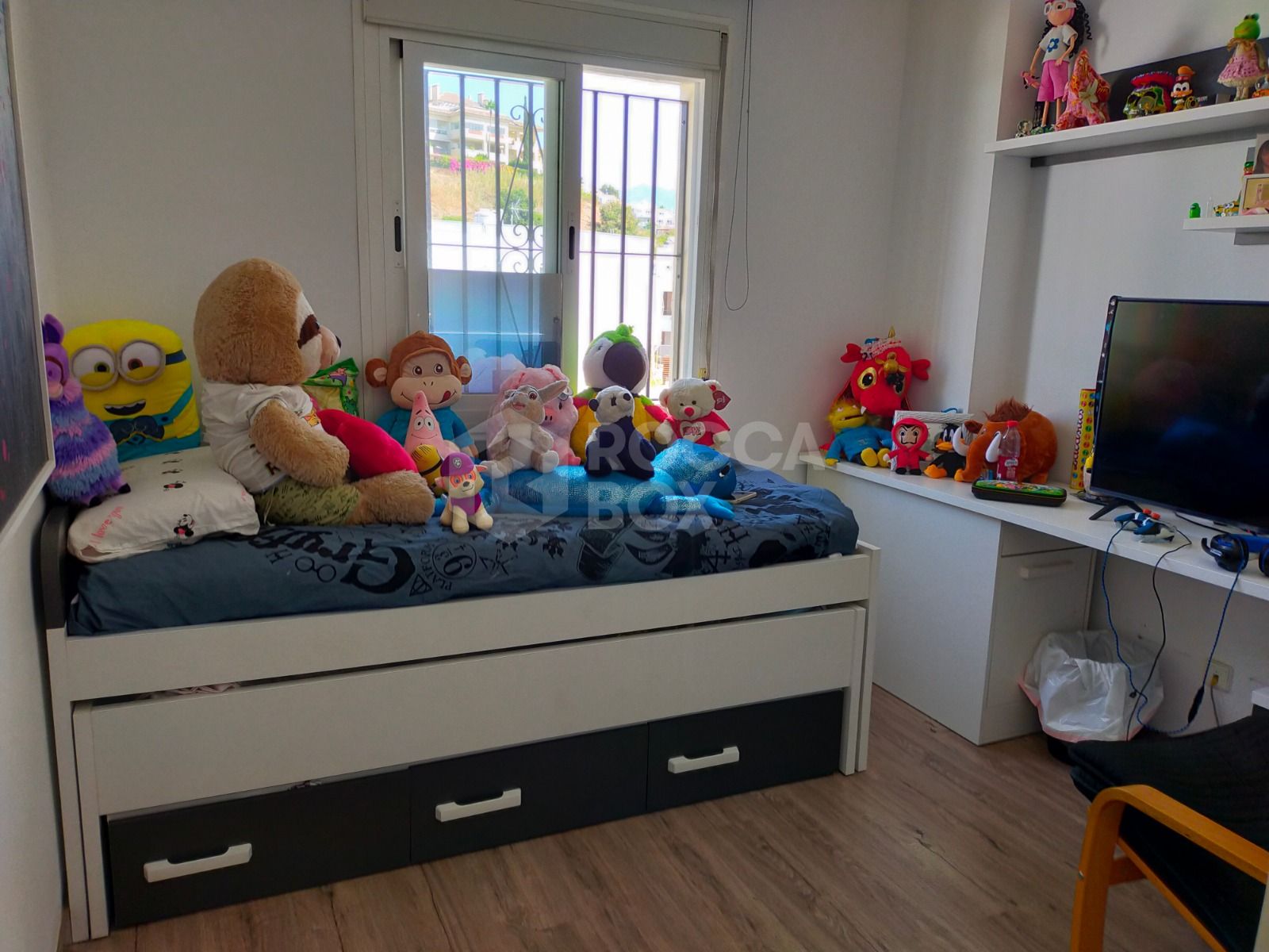 Elegant Three-Bedroom Town House with Private Garage and Communal Pool