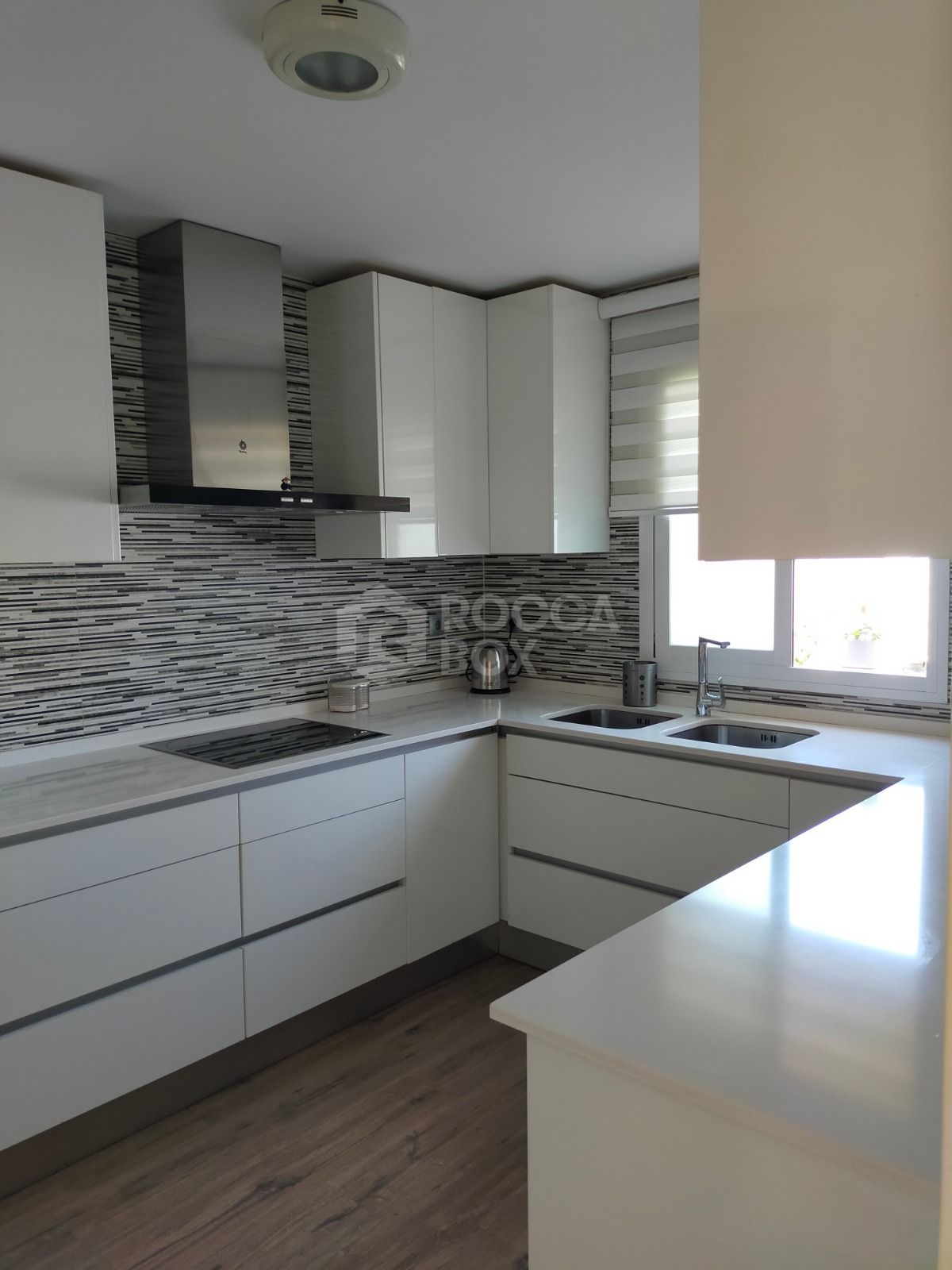 Elegant Three-Bedroom Town House with Private Garage and Communal Pool