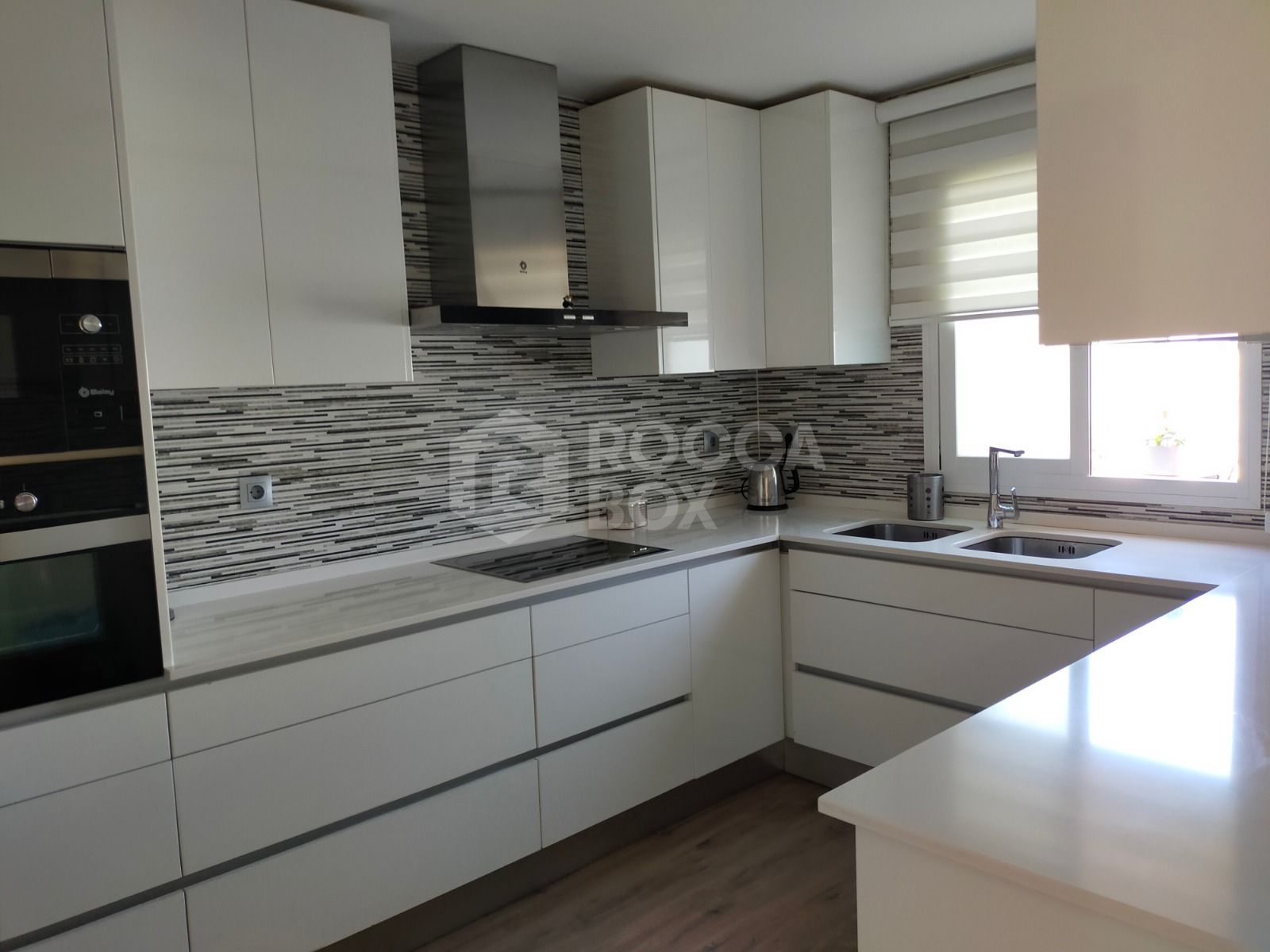 Elegant Three-Bedroom Town House with Private Garage and Communal Pool