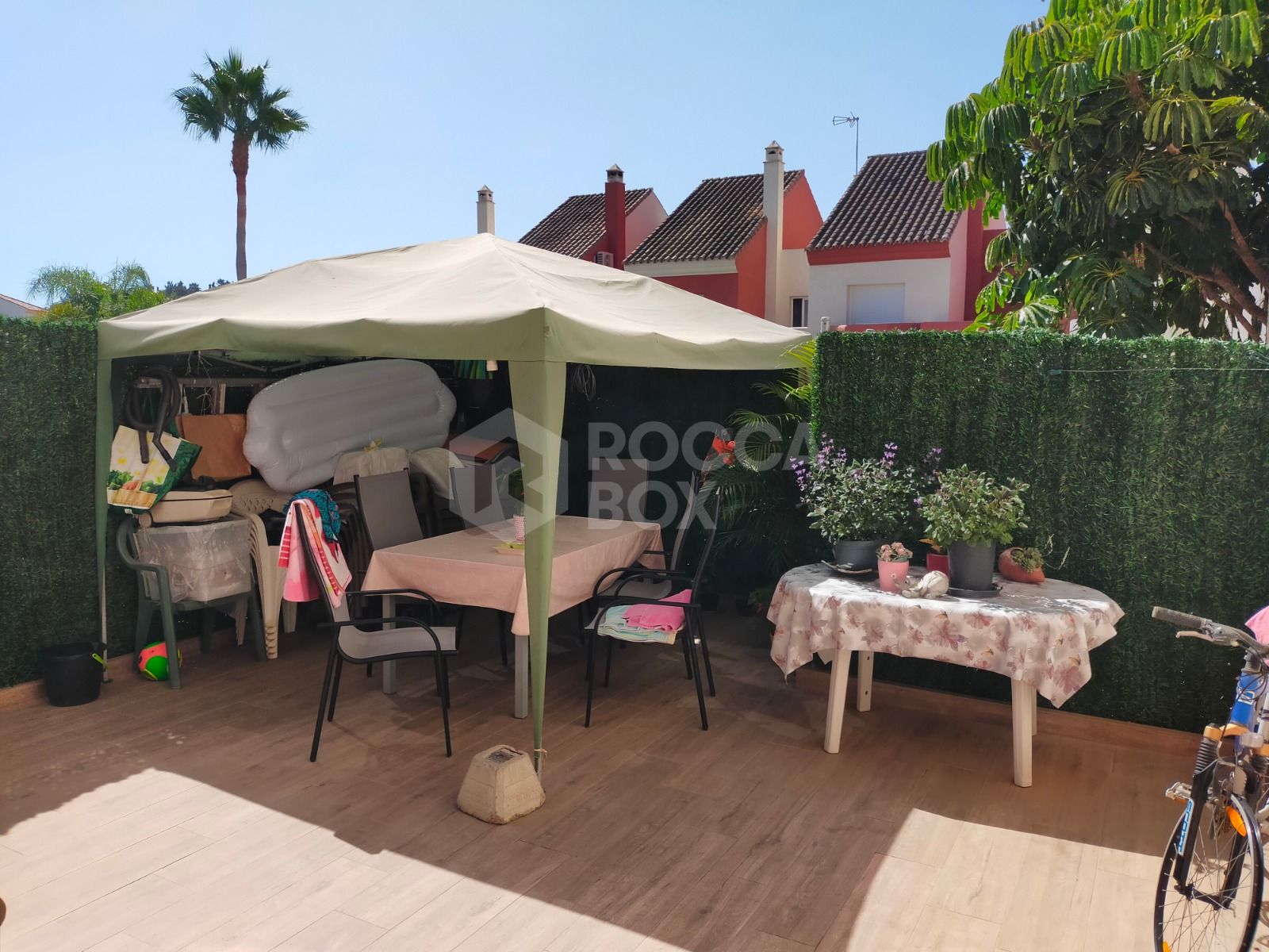 Elegant Three-Bedroom Town House with Private Garage and Communal Pool