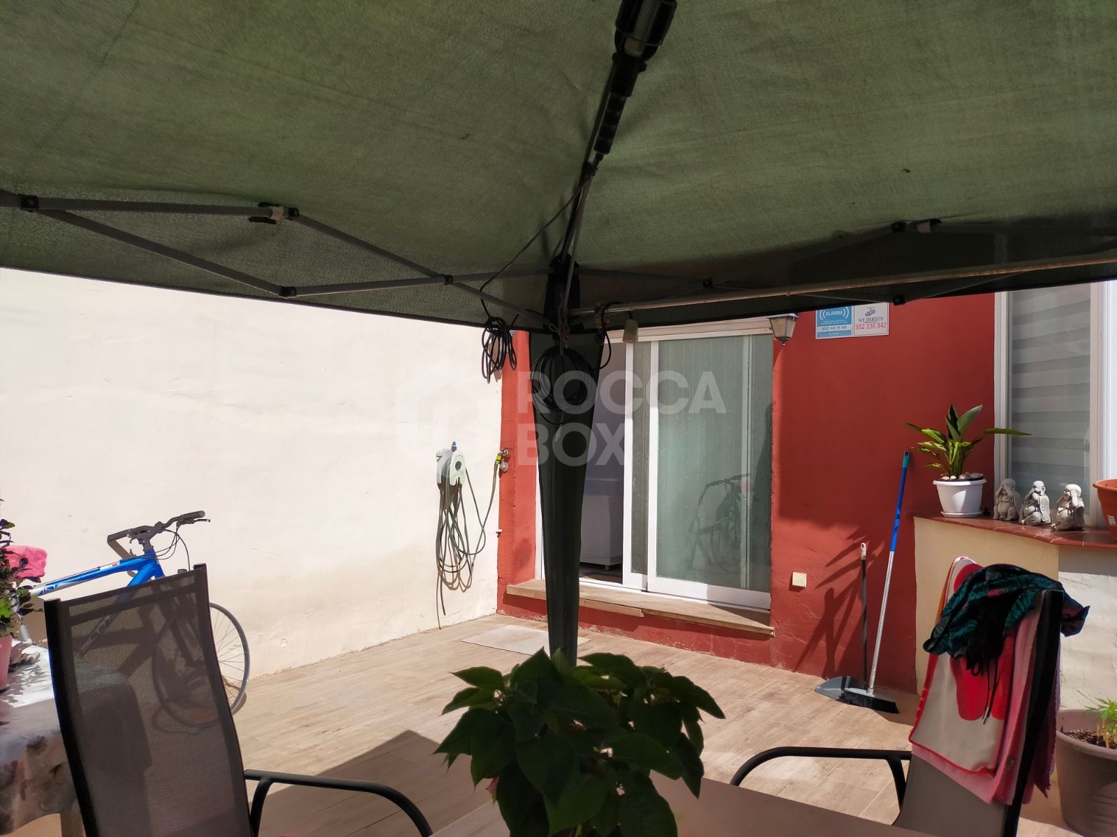 Elegant Three-Bedroom Town House with Private Garage and Communal Pool