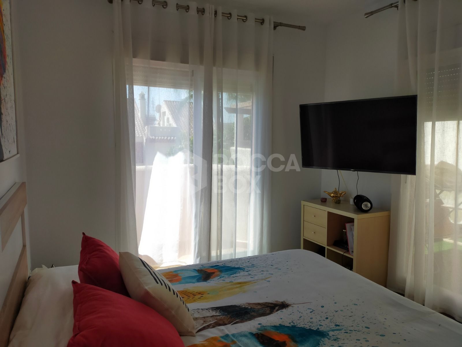 Elegant Three-Bedroom Town House with Private Garage and Communal Pool