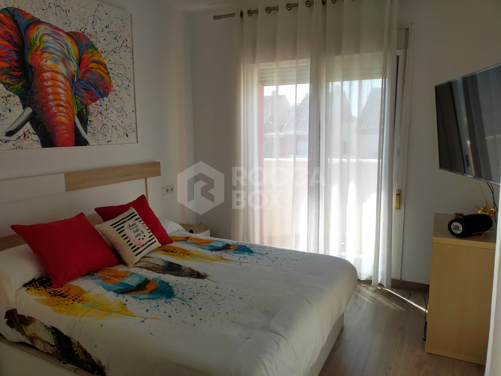 Elegant Three-Bedroom Town House with Private Garage and Communal Pool