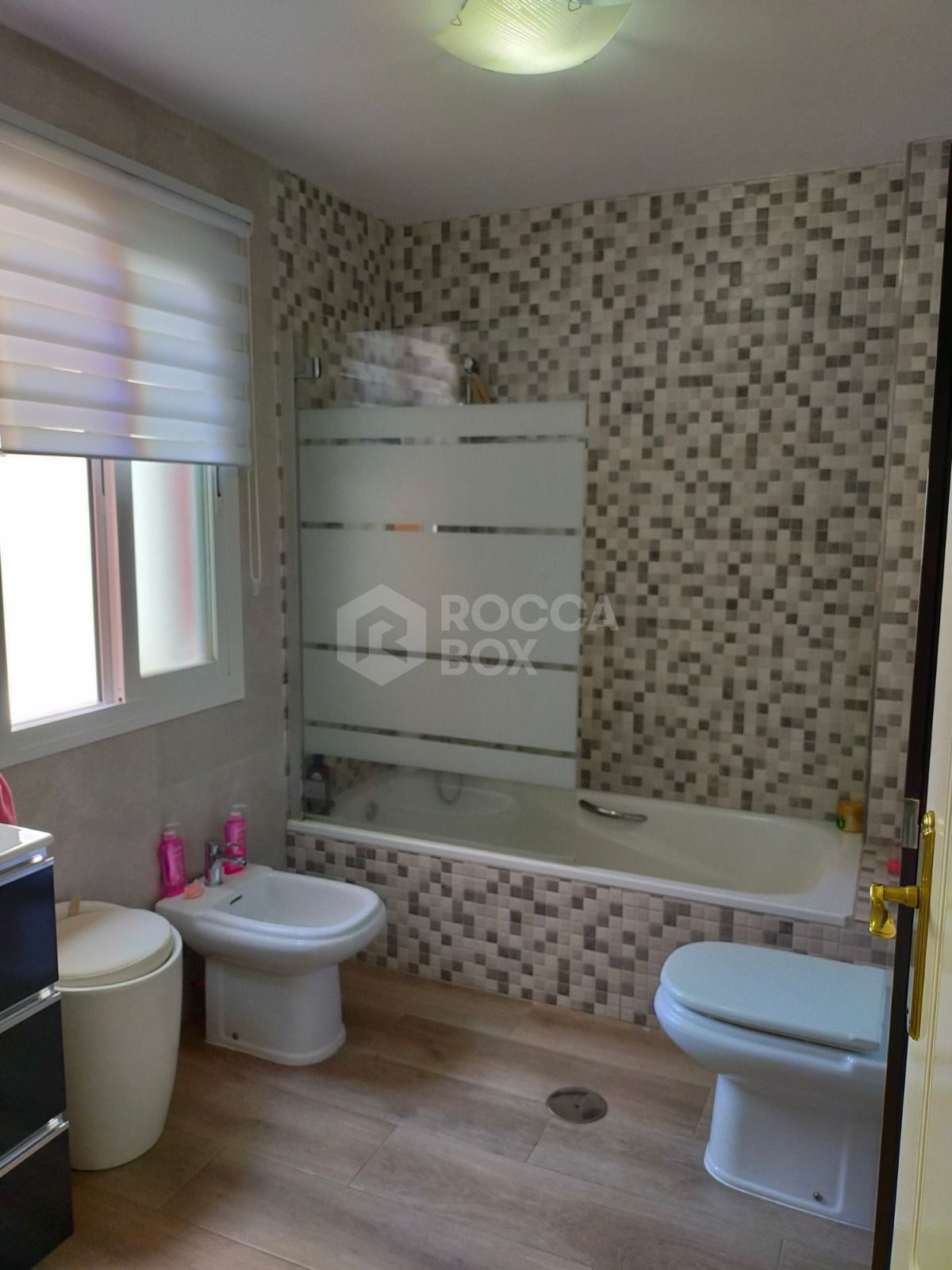 Elegant Three-Bedroom Town House with Private Garage and Communal Pool