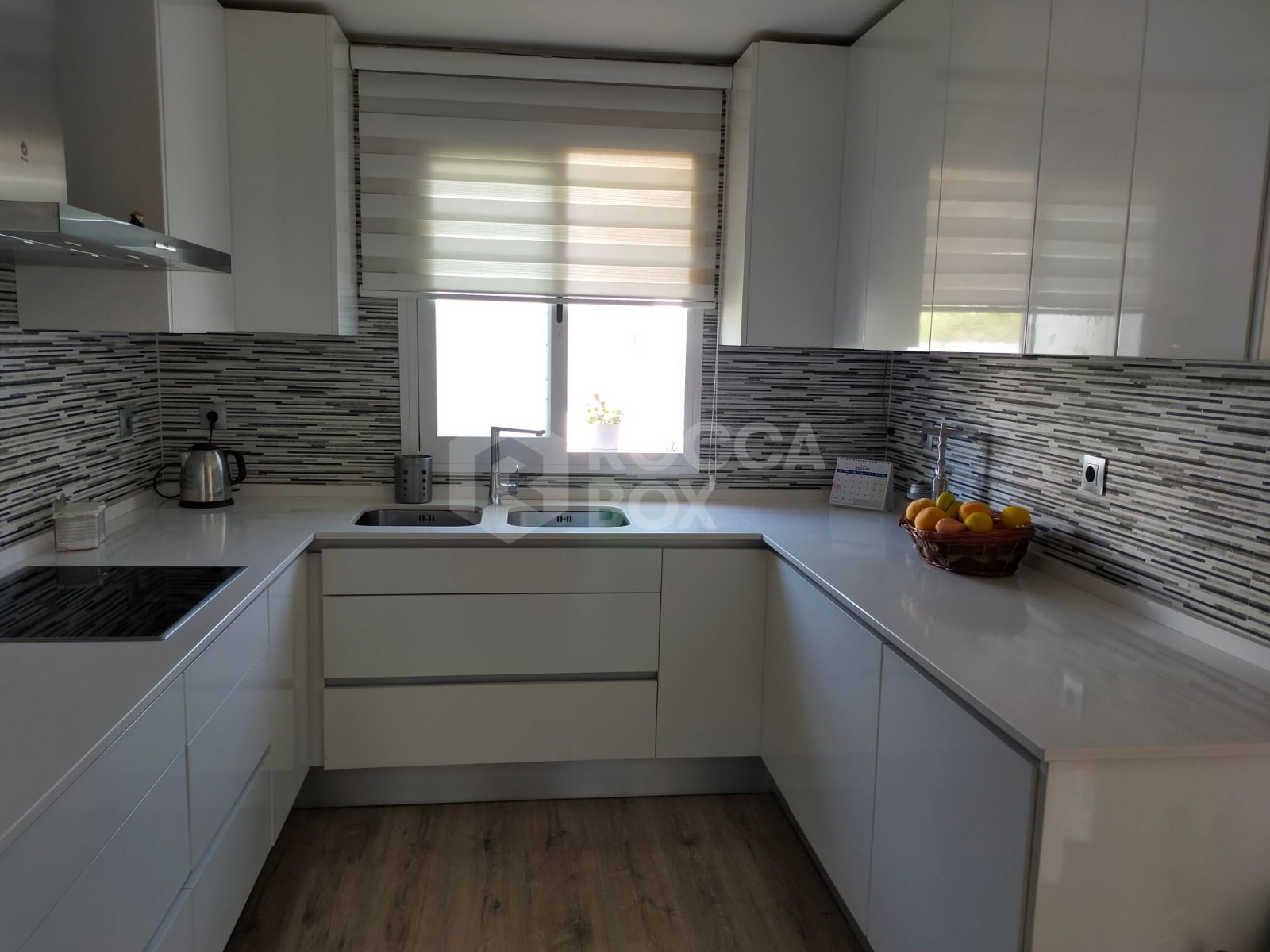 Elegant Three-Bedroom Town House with Private Garage and Communal Pool