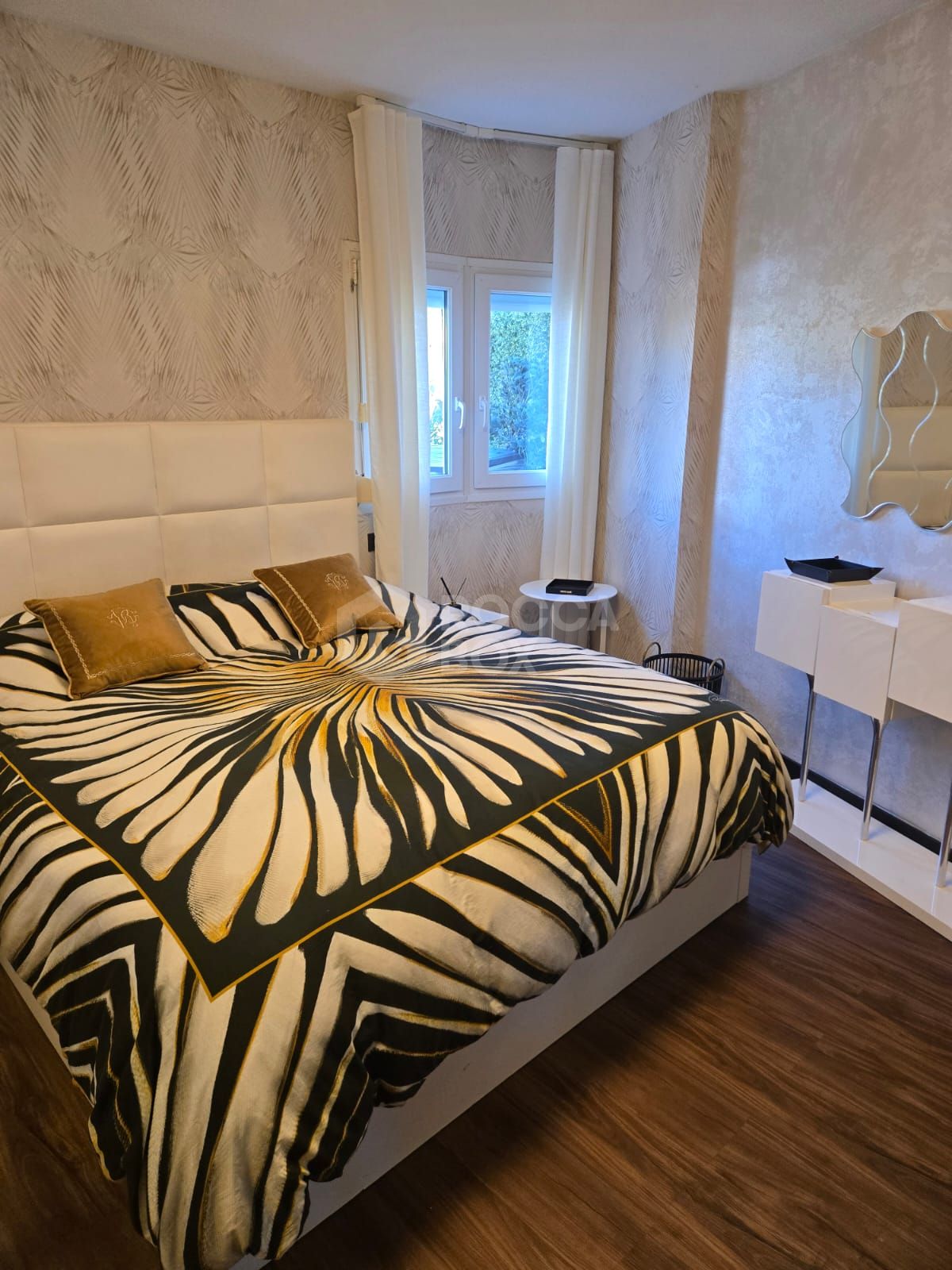 Elegant Three-Bedroom Apartment with Spacious Terrace