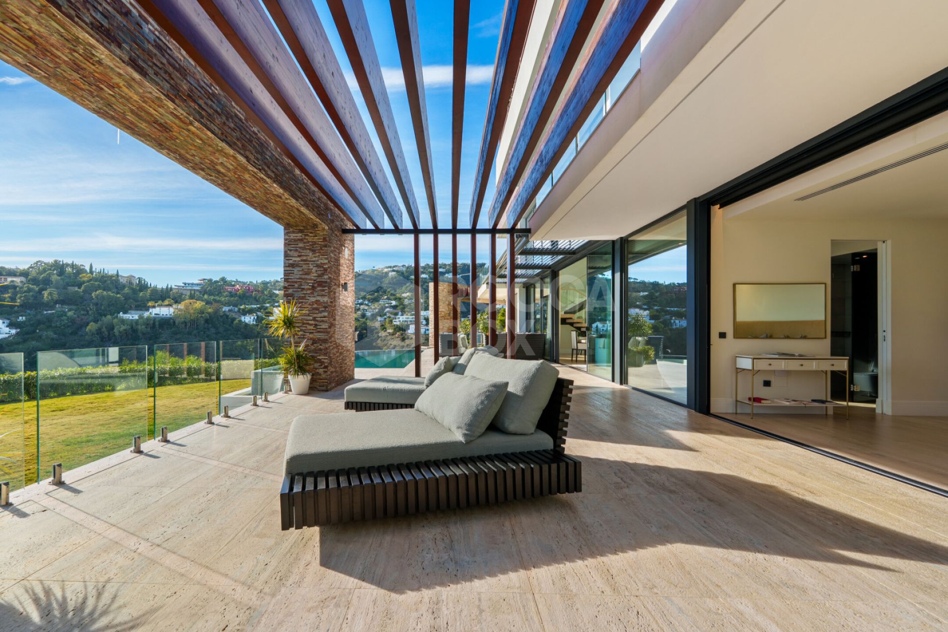 Contemporary Comfort & Privacy Surrounded By Panoramic Andalusian Views in Benahavis.