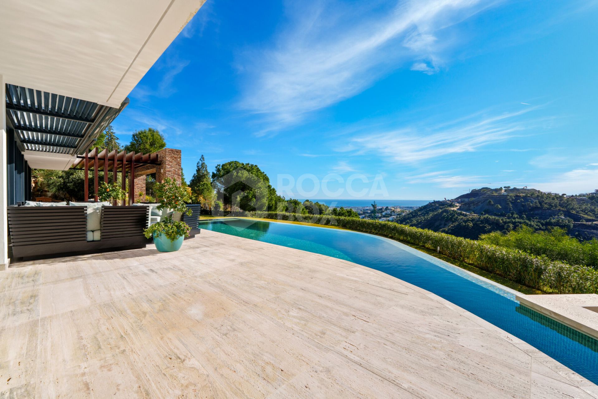 Contemporary Comfort & Privacy Surrounded By Panoramic Andalusian Views in Benahavis.