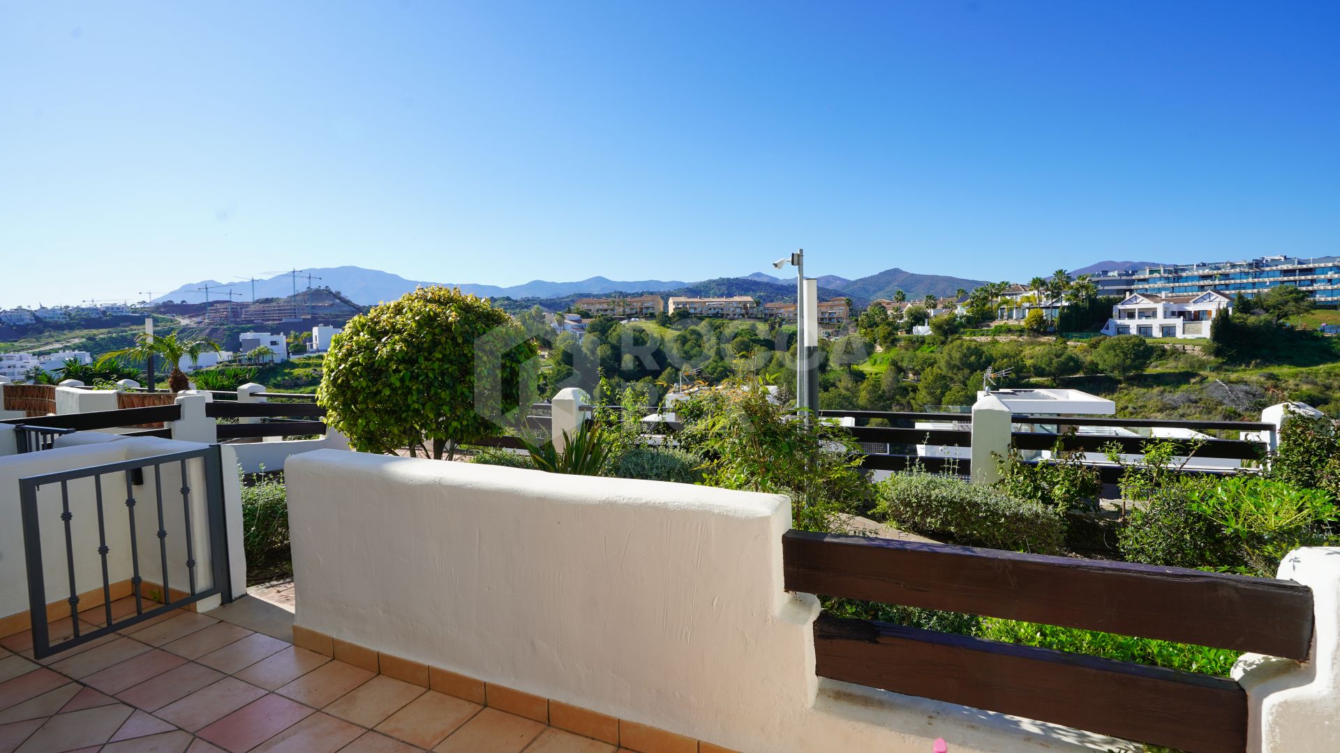 Elegant Ground Floor Apartment in Gated Community with Sea Views