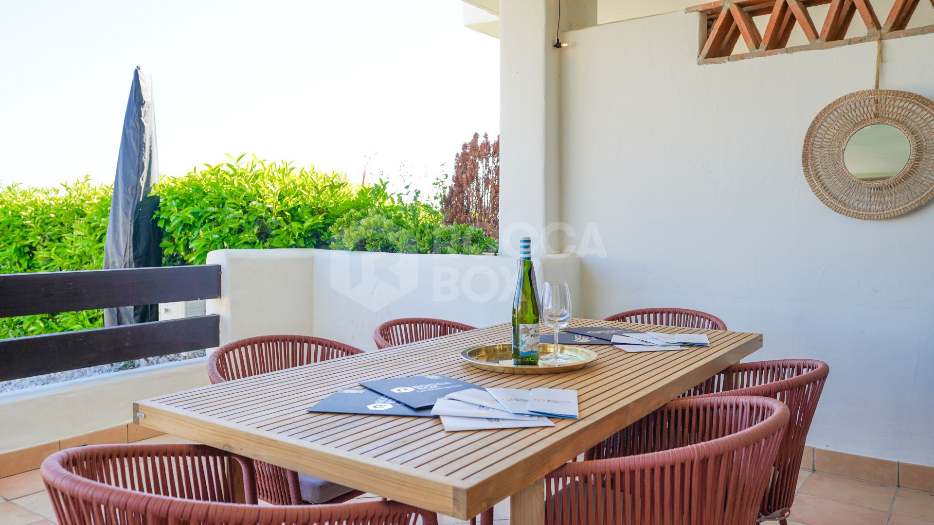 Elegant Ground Floor Apartment in Gated Community with Sea Views