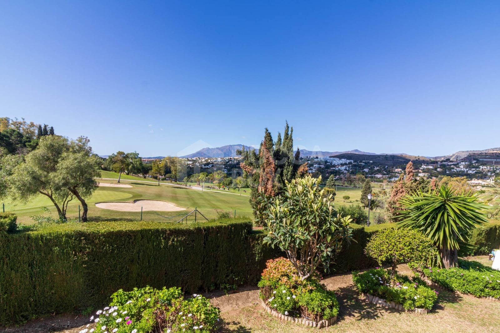 Charming Frontline Golf Corner Townhouse with Panoramic Views