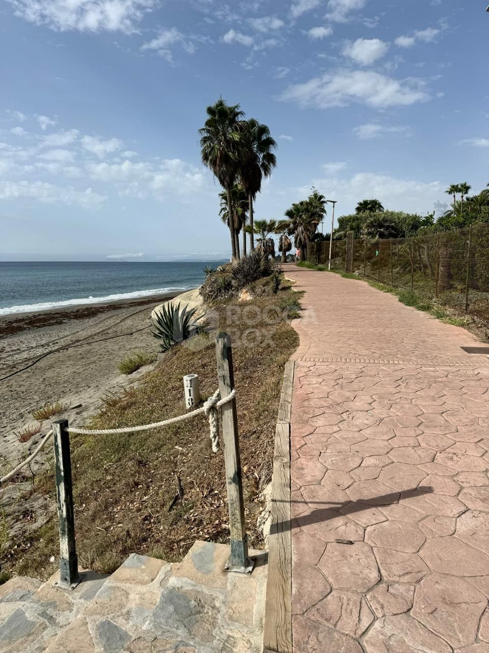 Luxurious Beachside Apartment in Estepona's Prestigious Hacienda Beach