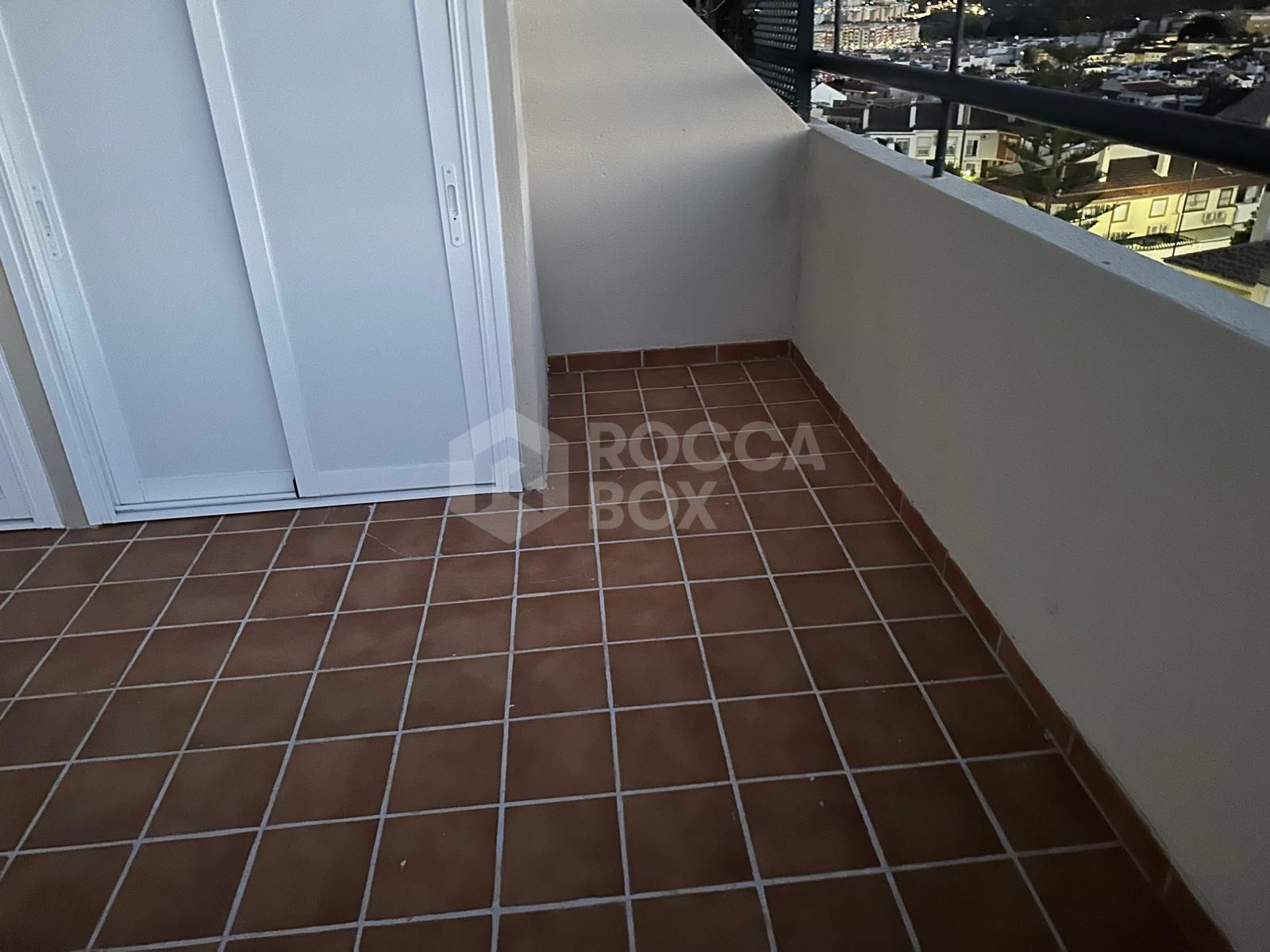 Two-Bedroom Apartment with Sea and Mountain Views in Mijas Costa