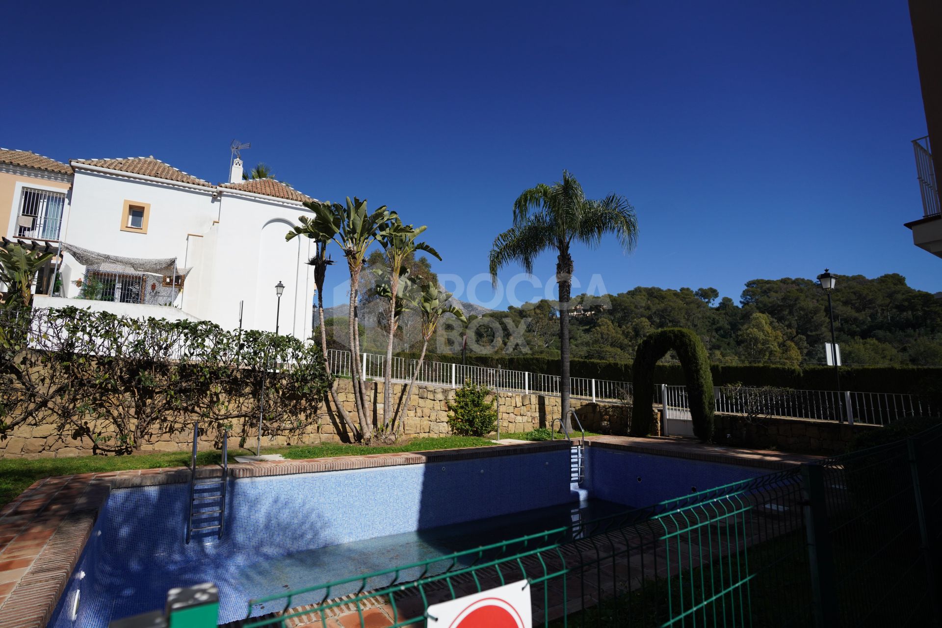 Elegant Townhouse Near Puerto Banús with Terrace, Garage & Pools
