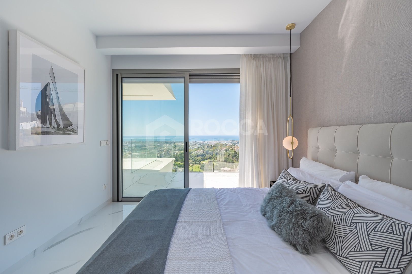 Sleek Corner Apartment with Panoramic Golf & Sea Views