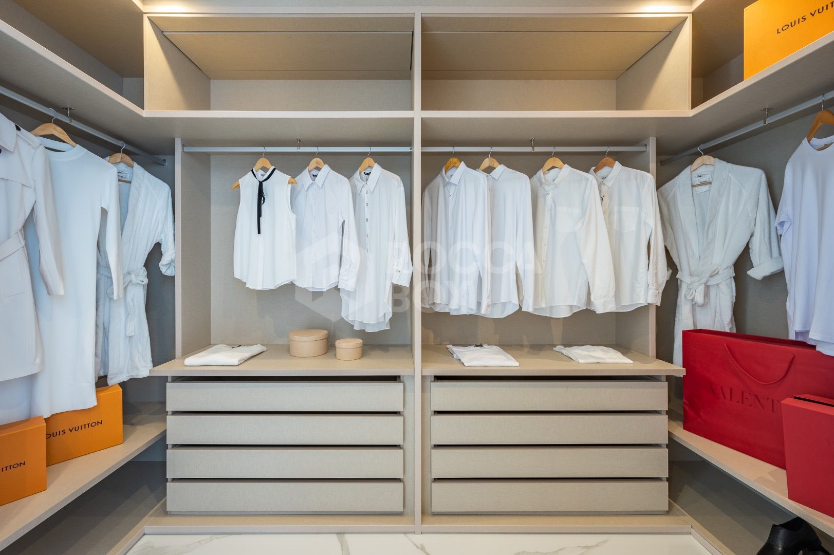 Sleek Corner Apartment with Panoramic Golf & Sea Views