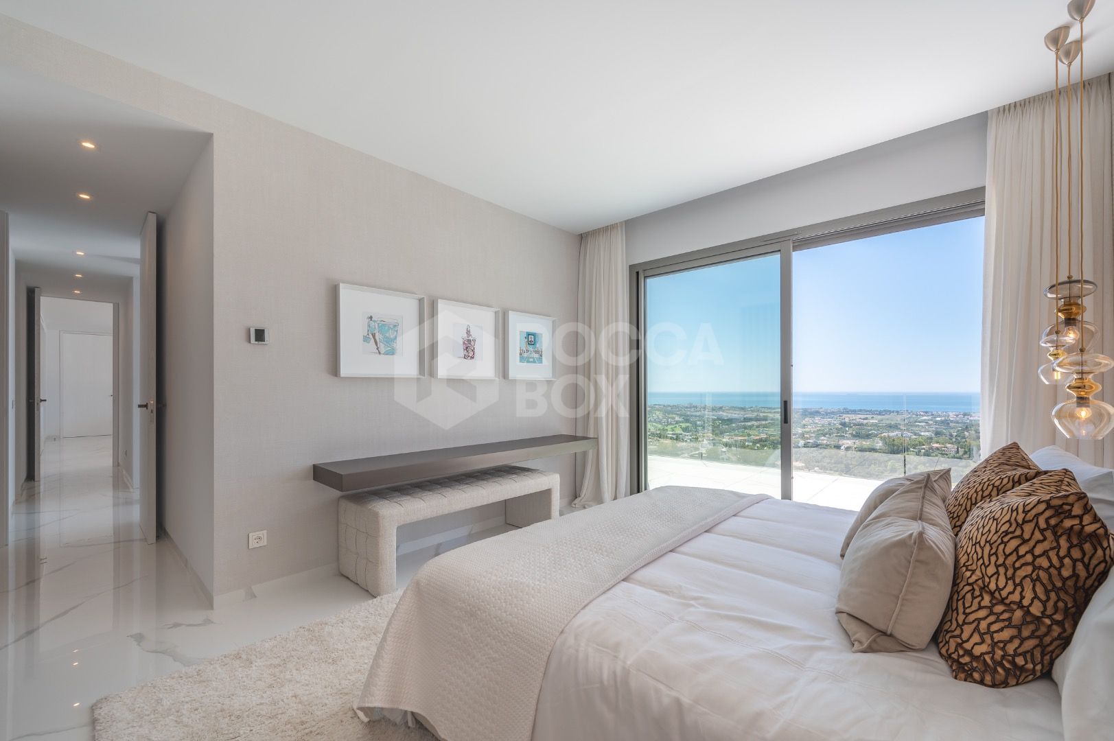 Sleek Corner Apartment with Panoramic Golf & Sea Views