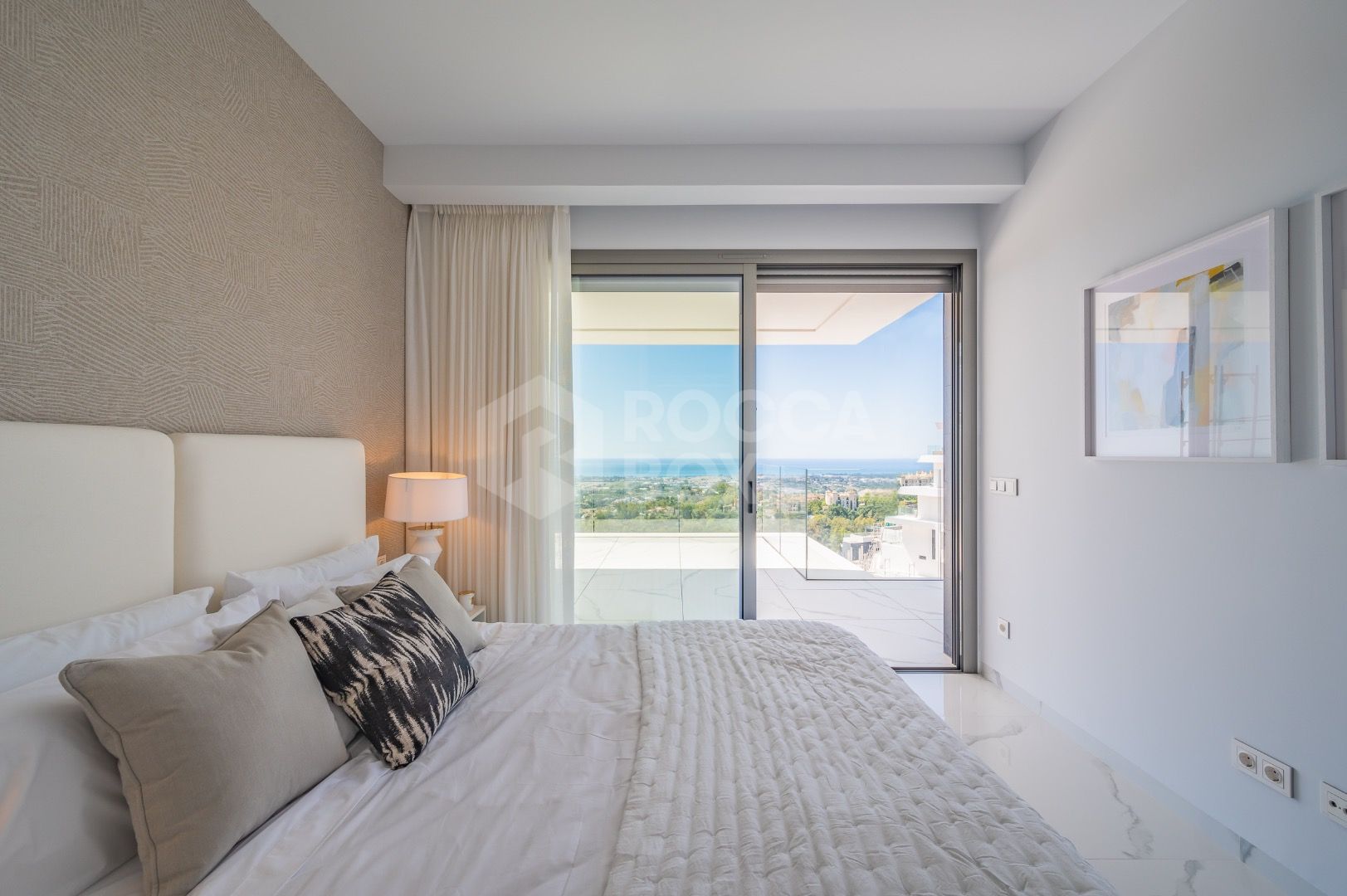 Sleek Corner Apartment with Panoramic Golf & Sea Views