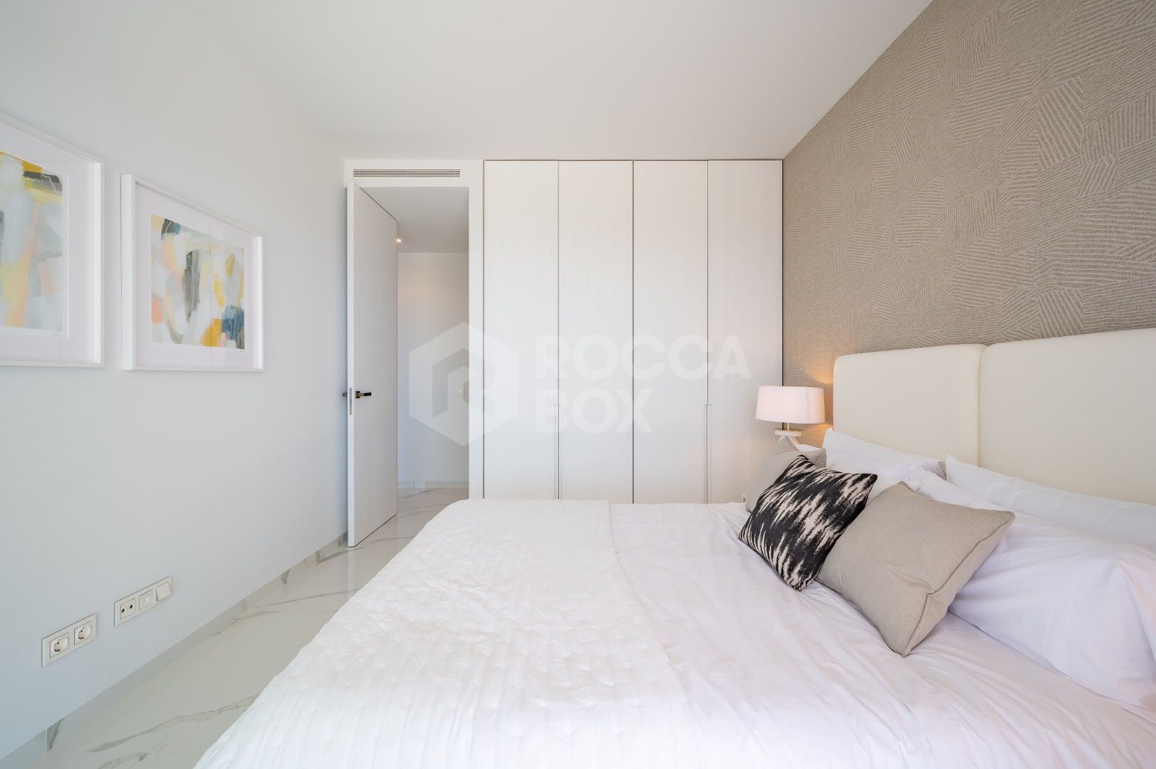 Sleek Corner Apartment with Panoramic Golf & Sea Views