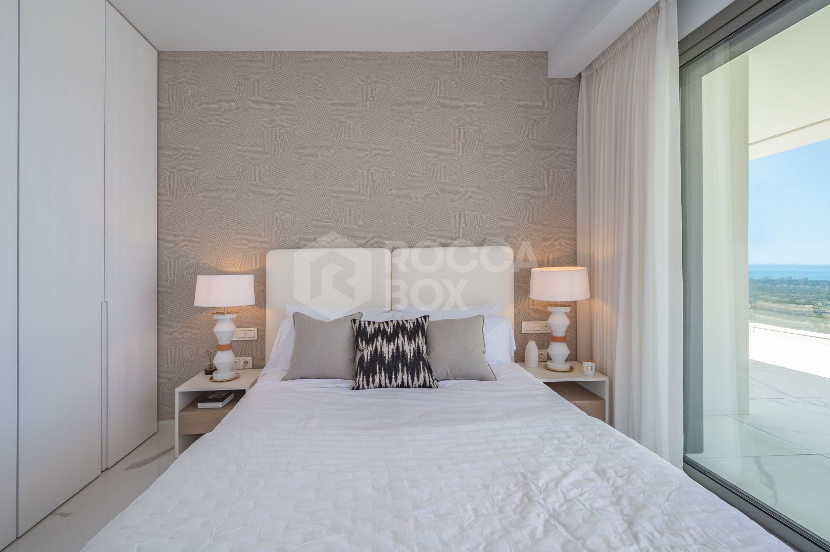 Sleek Corner Apartment with Panoramic Golf & Sea Views